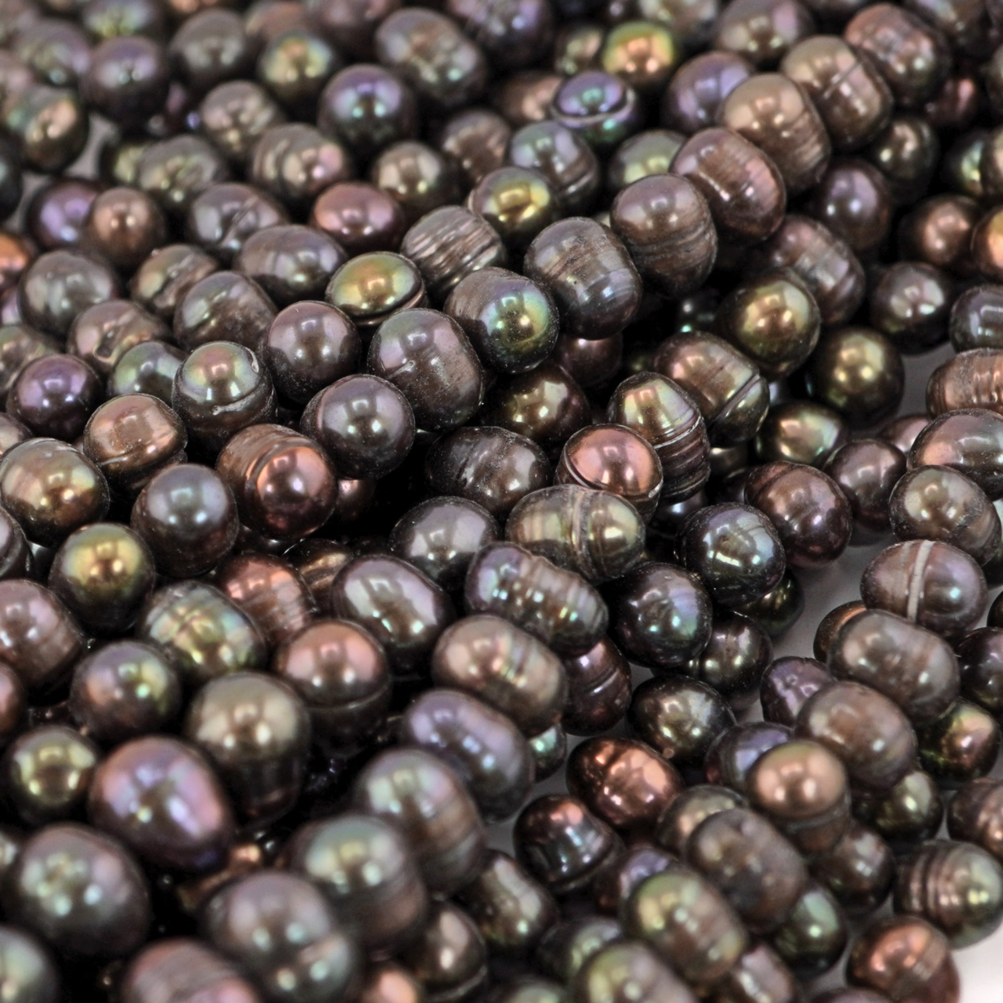 8x7mm peacock oval freshwater pearls