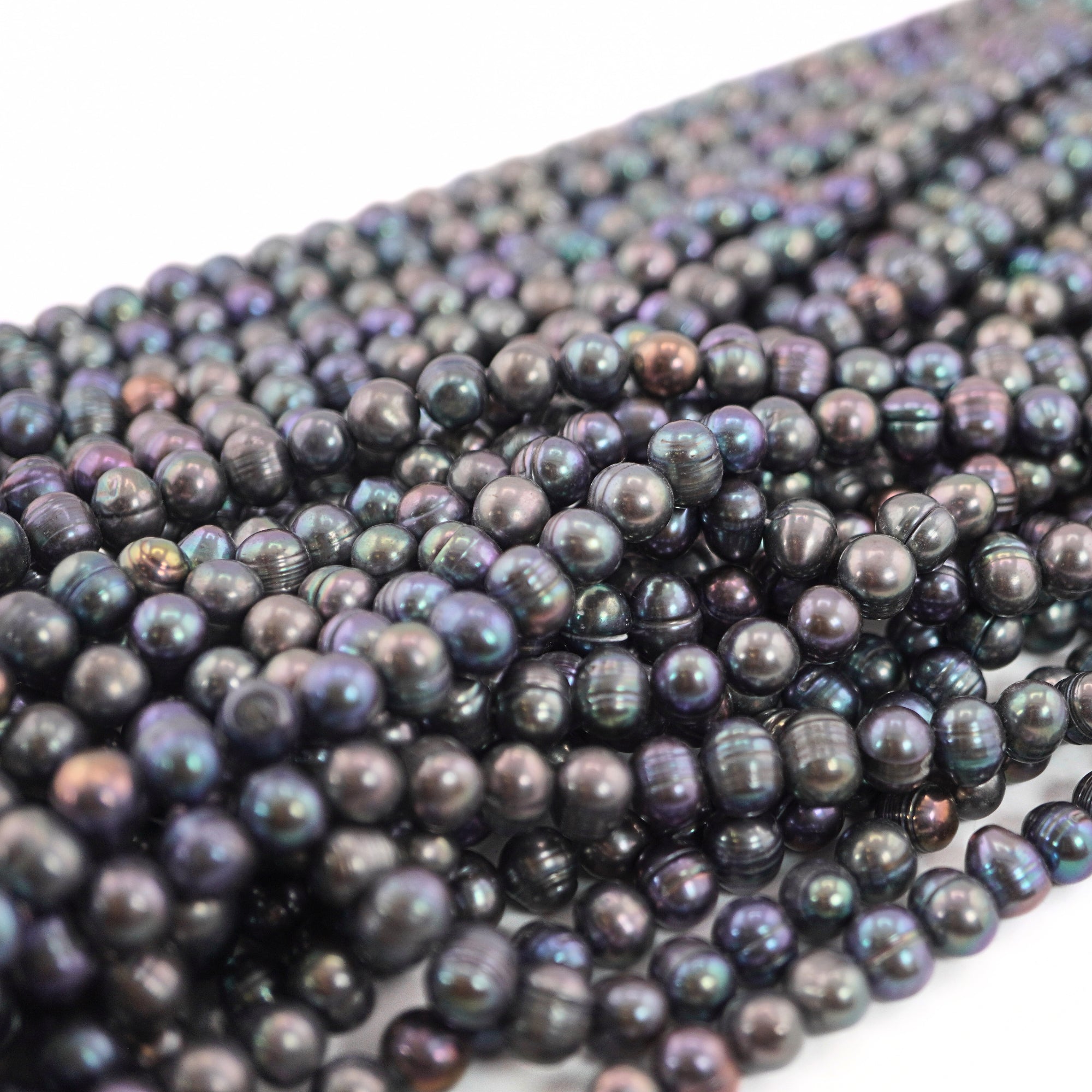 9x7mm peacock pearls