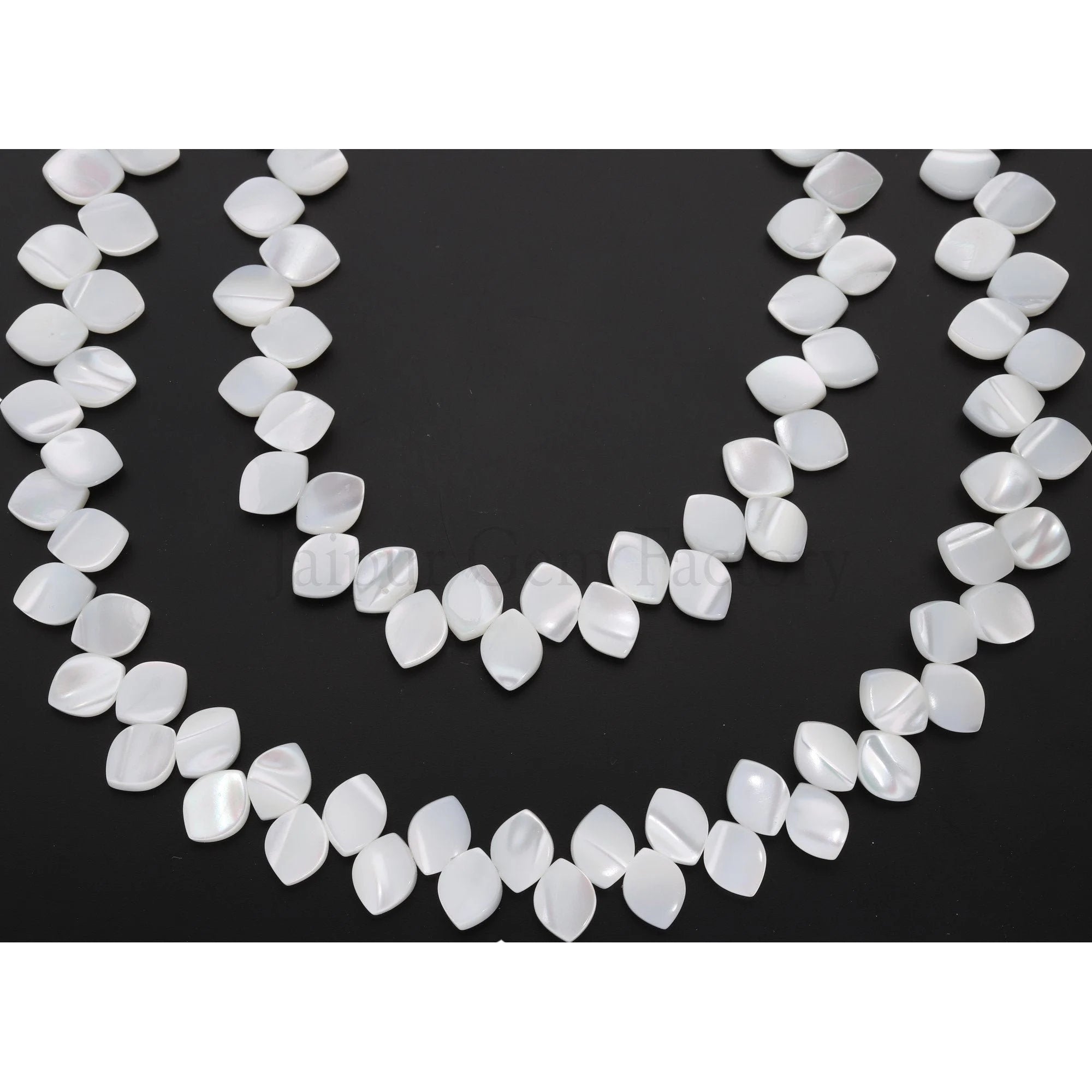 White Mother of Pearl Marquise Shape Strand Beads