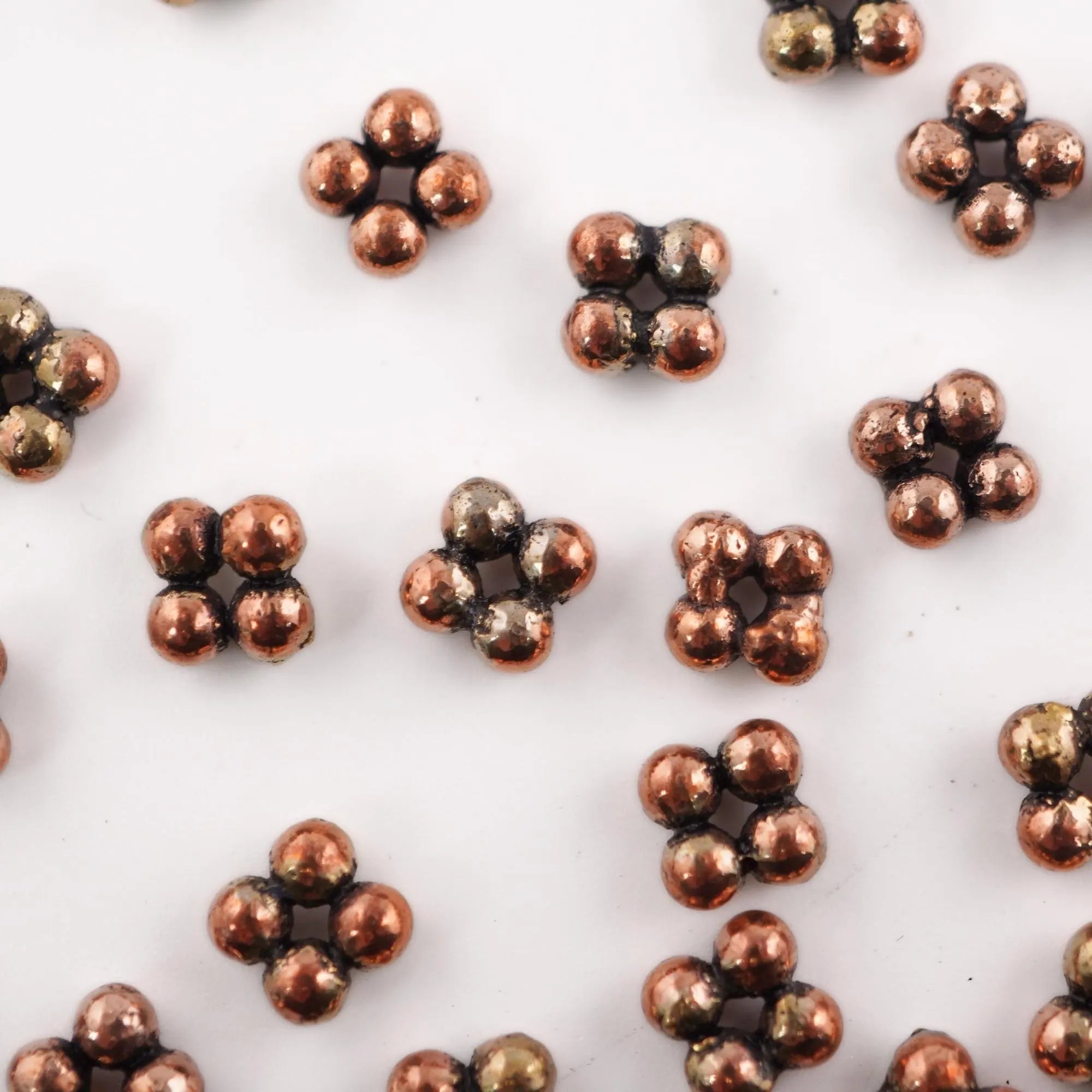 Antique copper daisy beads TierraCast