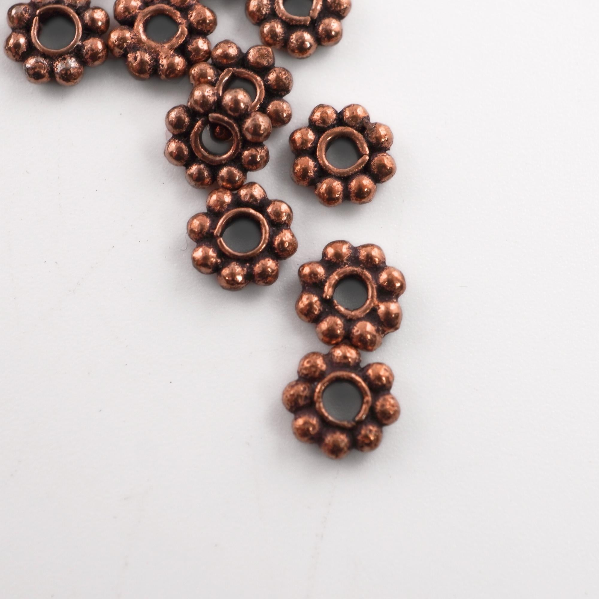 Antique copper daisy spacer beads 125 pcs