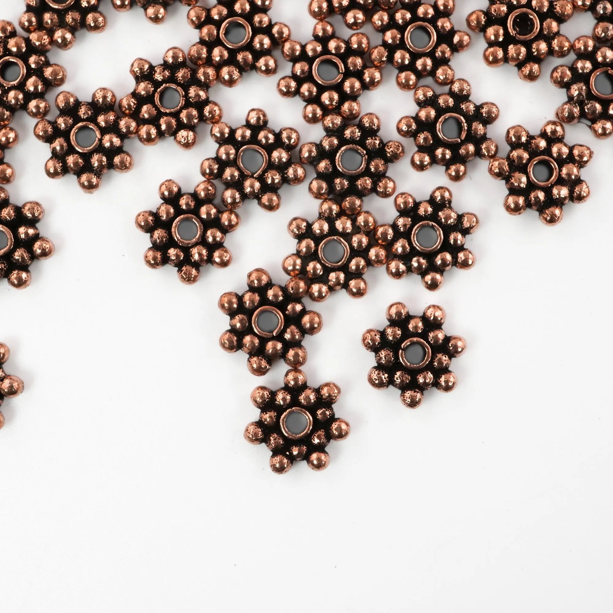 Boho flower shaped metal bead spacers