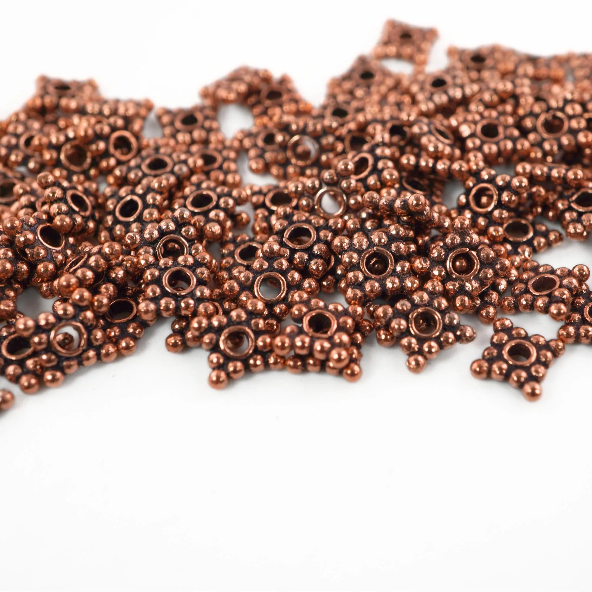 Boho style antique copper daisy beads