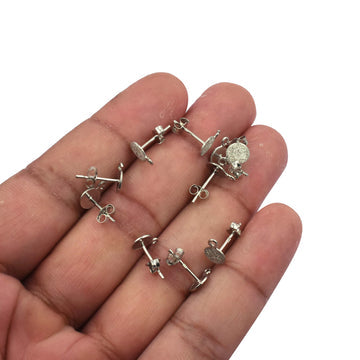 Close-up of Stardust Coin Disc Sterling Silver Earring Posts