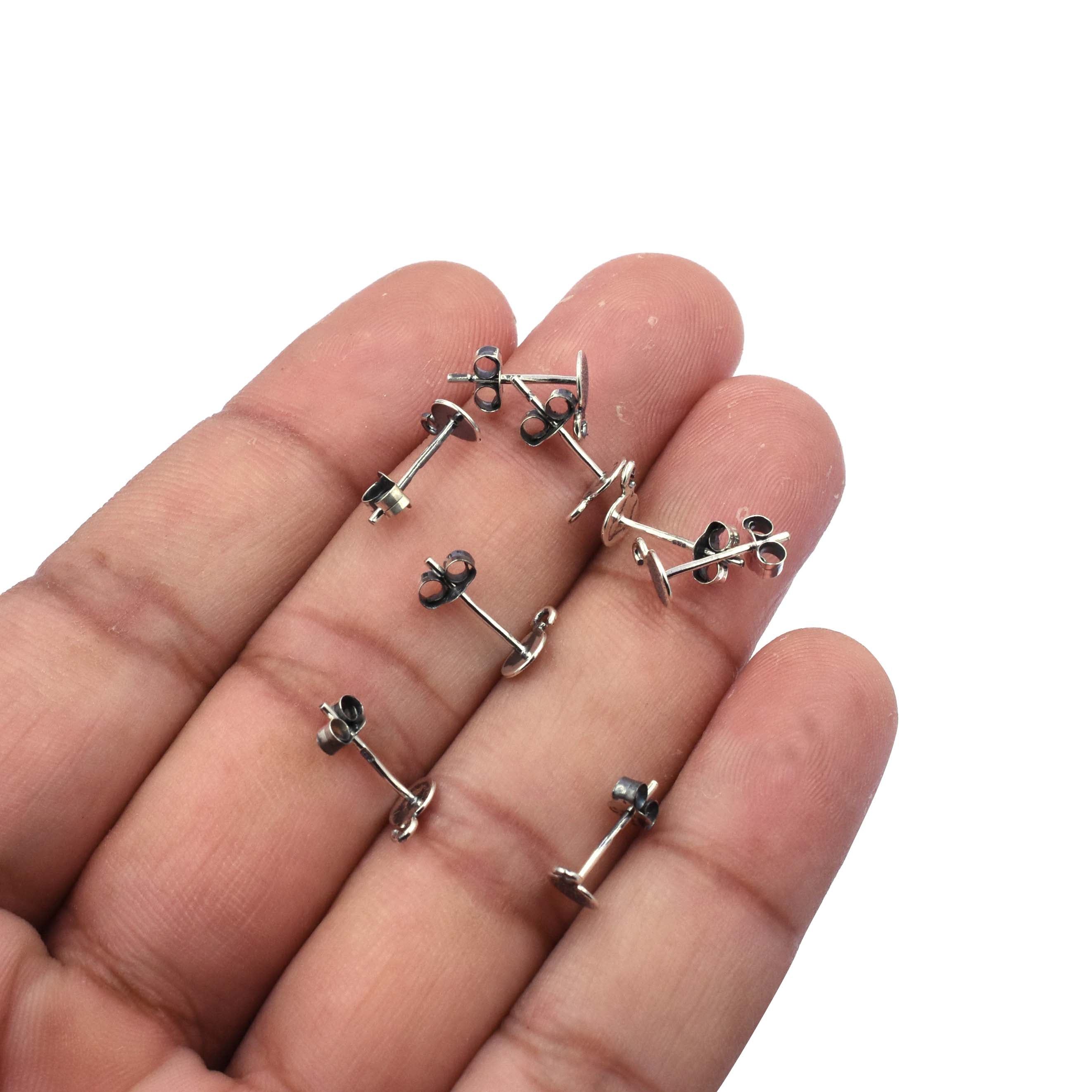 Close-up of Sterling Silver Disc Earrings with Open Loop