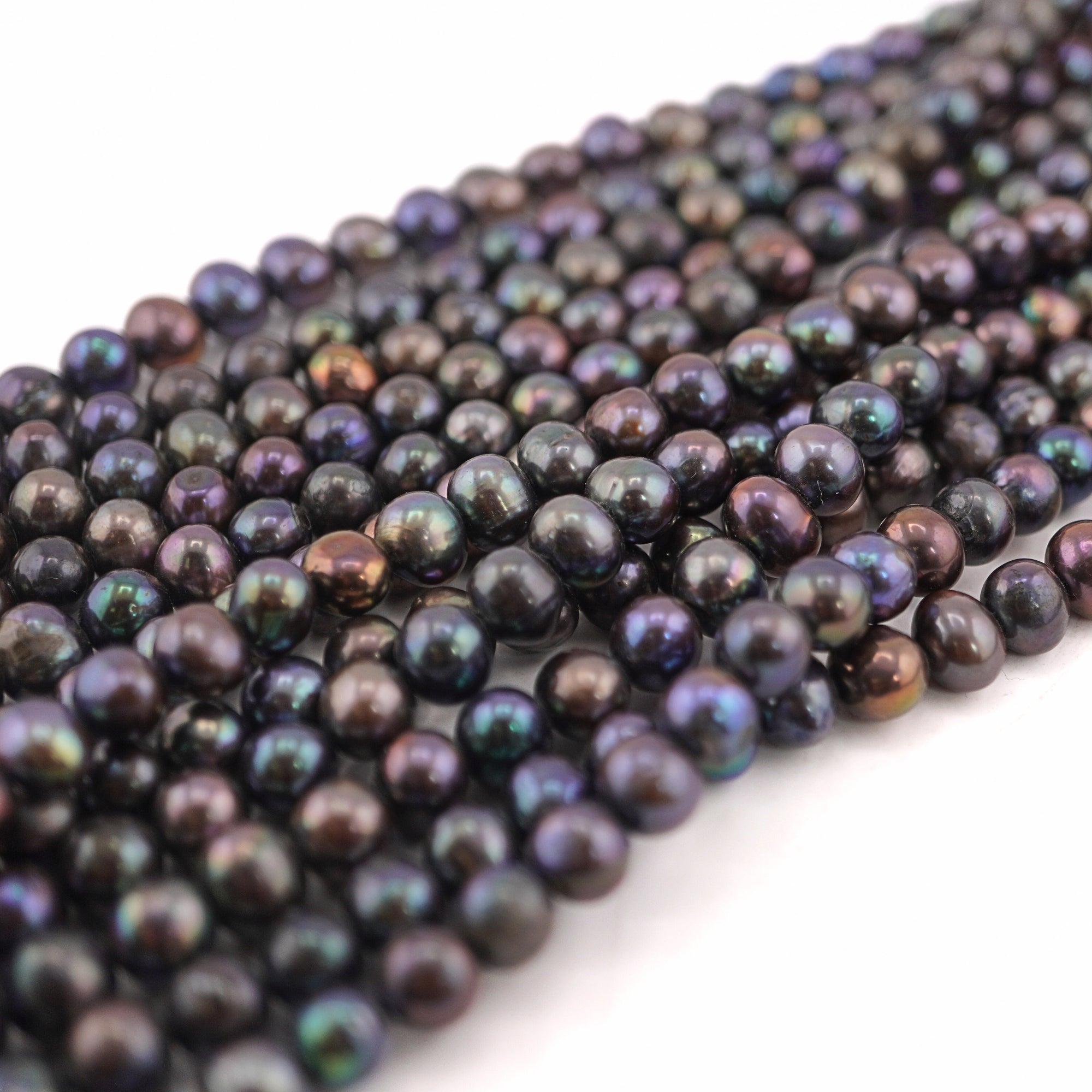 Wholesale peacock pearls 8x6 mm