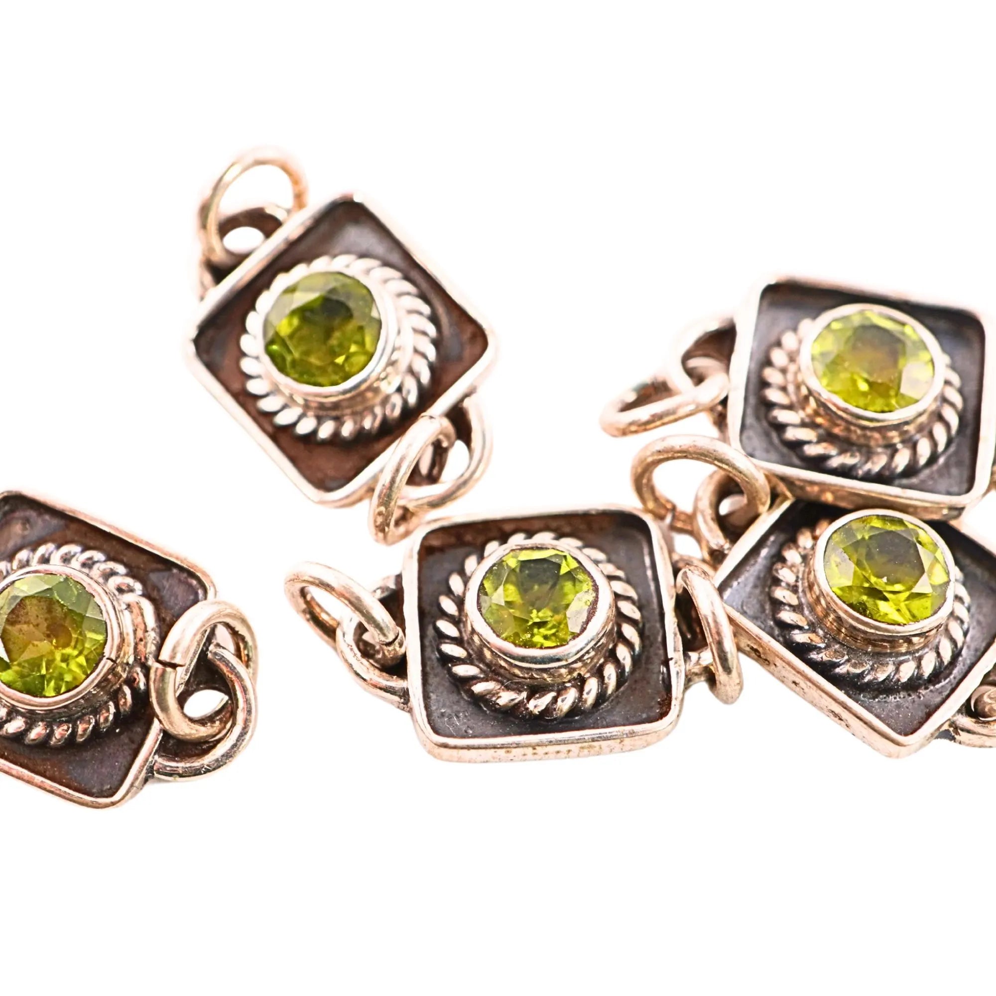 Handmade peridot beads in oxidized silver