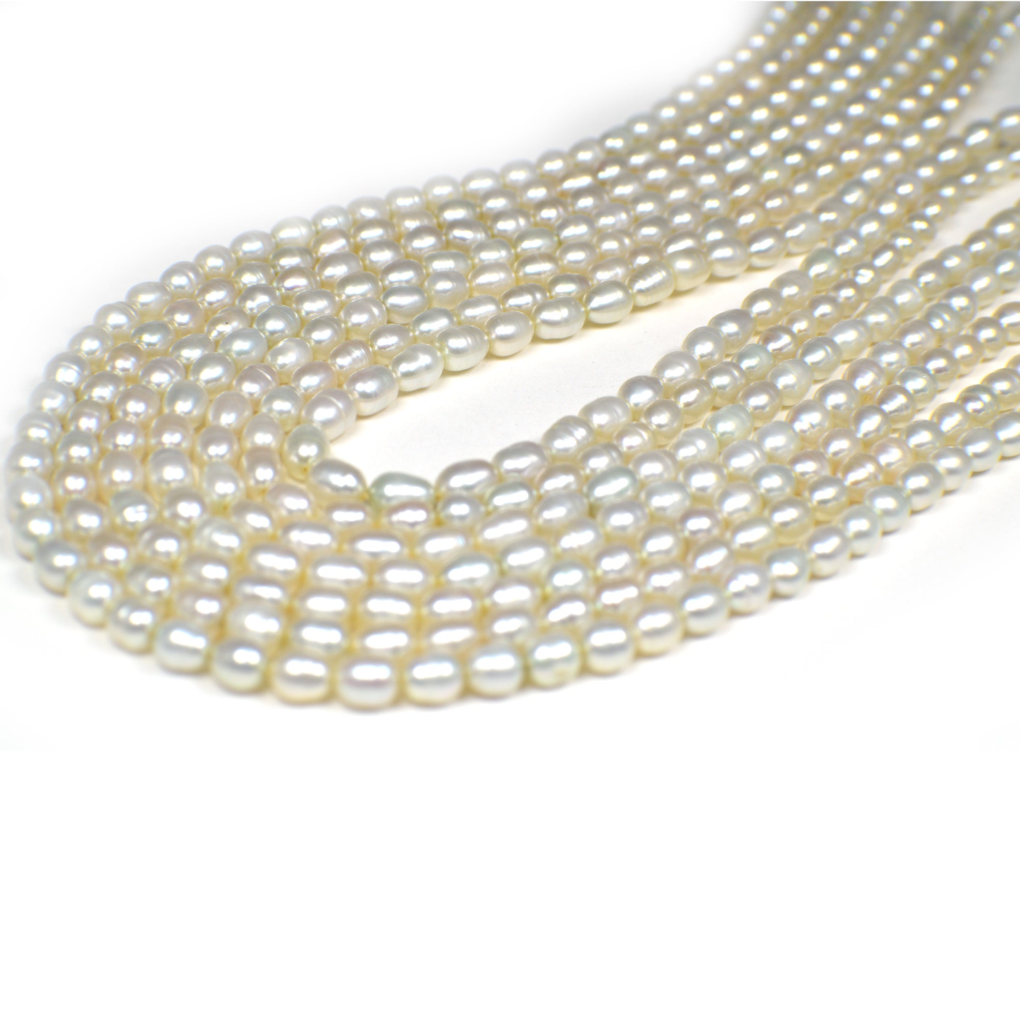 5x4 - 6x4 MM Light Green Rice Freshwater Pearls Beads