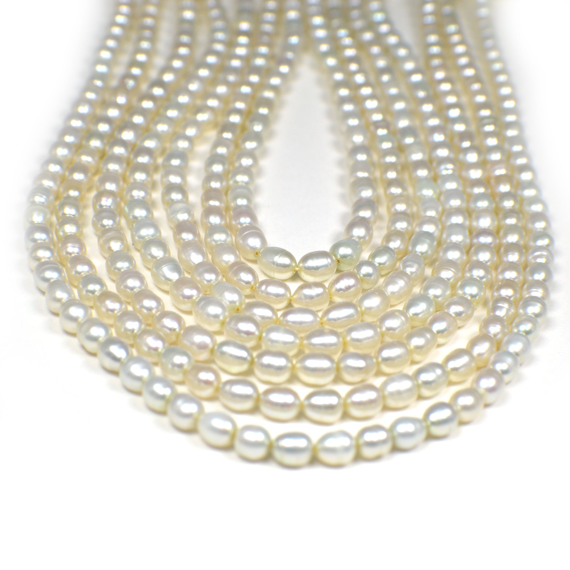 5x4 - 6x4 MM Light Green Rice Freshwater Pearls Beads