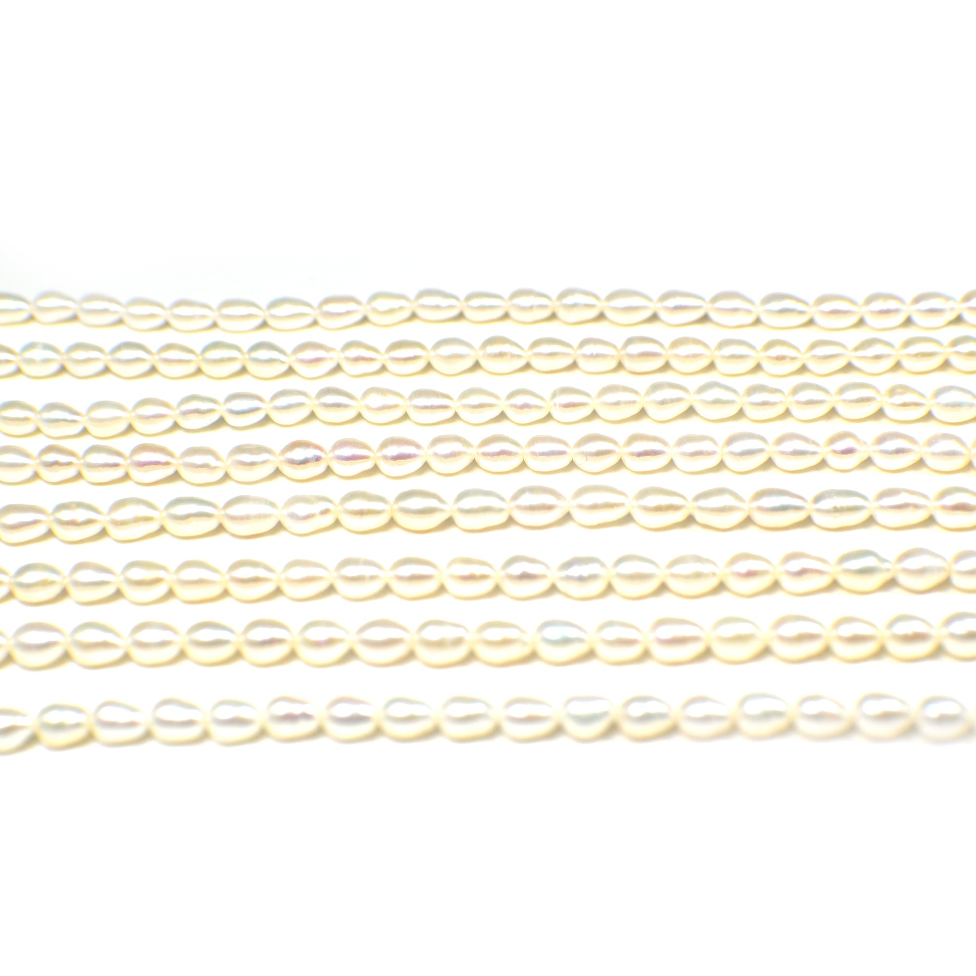 5 x 4 - 6 x 4 MM White Rice Freshwater Pearls Beads