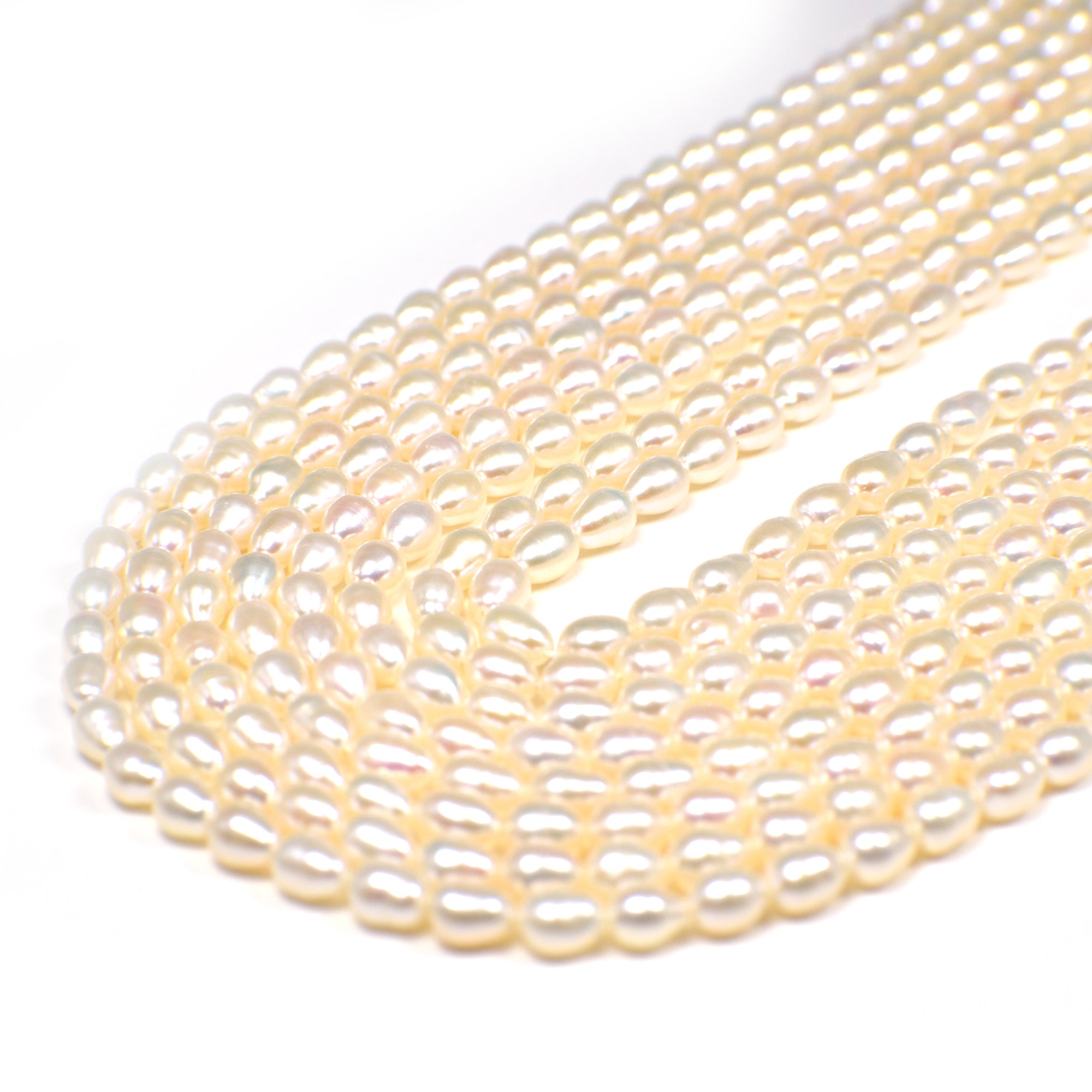 5 x 4 - 6 x 4 MM White Rice Freshwater Pearls Beads