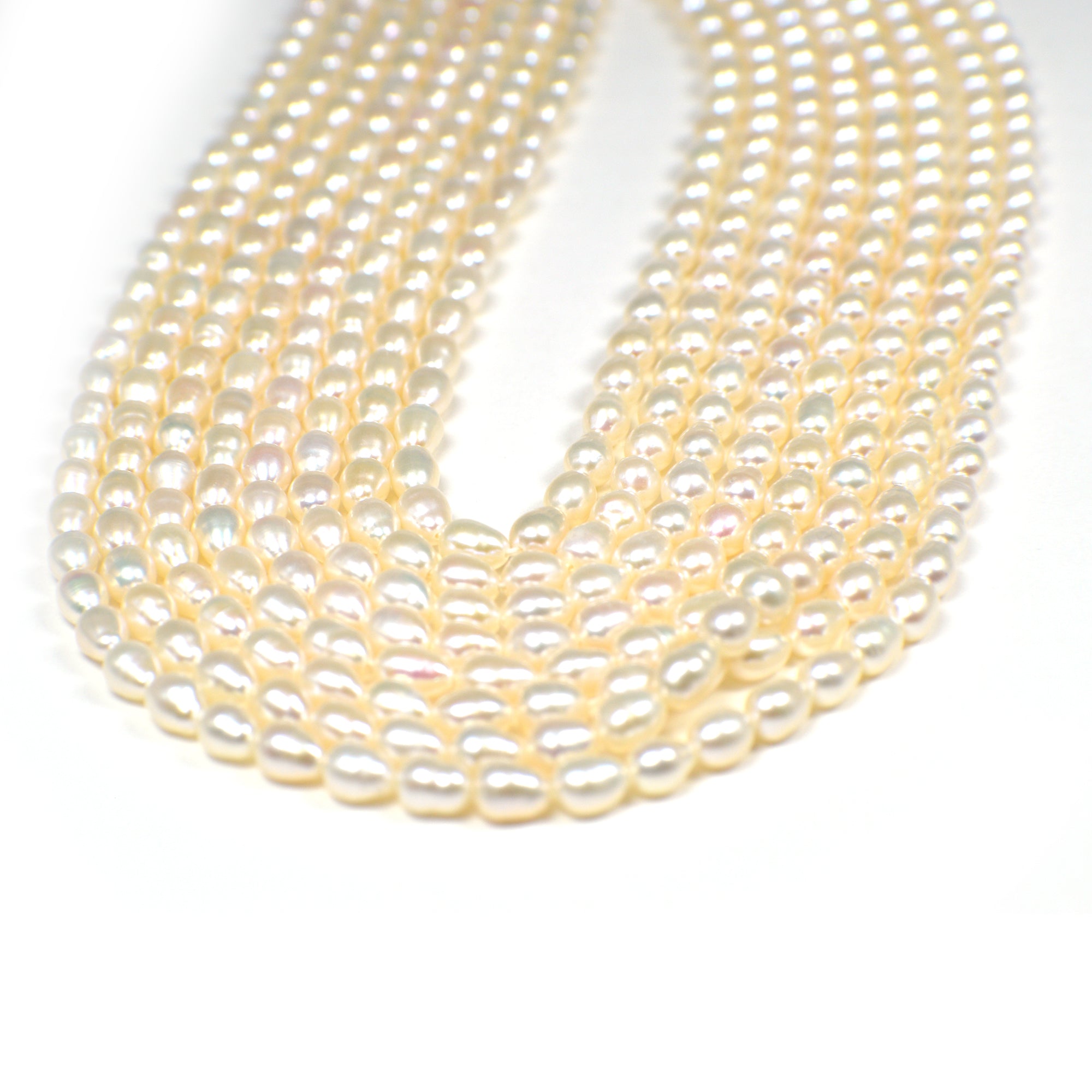 5 x 4 - 6 x 4 MM White Rice Freshwater Pearls Beads