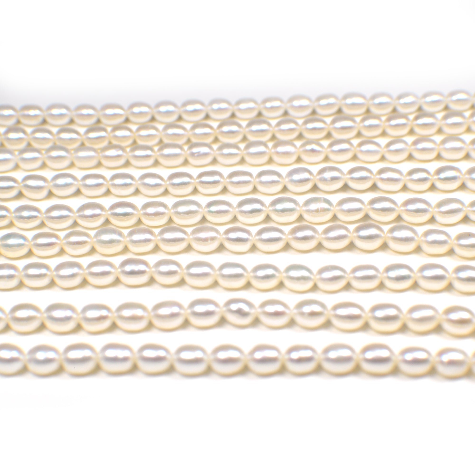 6 x 4 - 6 x 5 MM White Rice Freshwater Pearls Beads