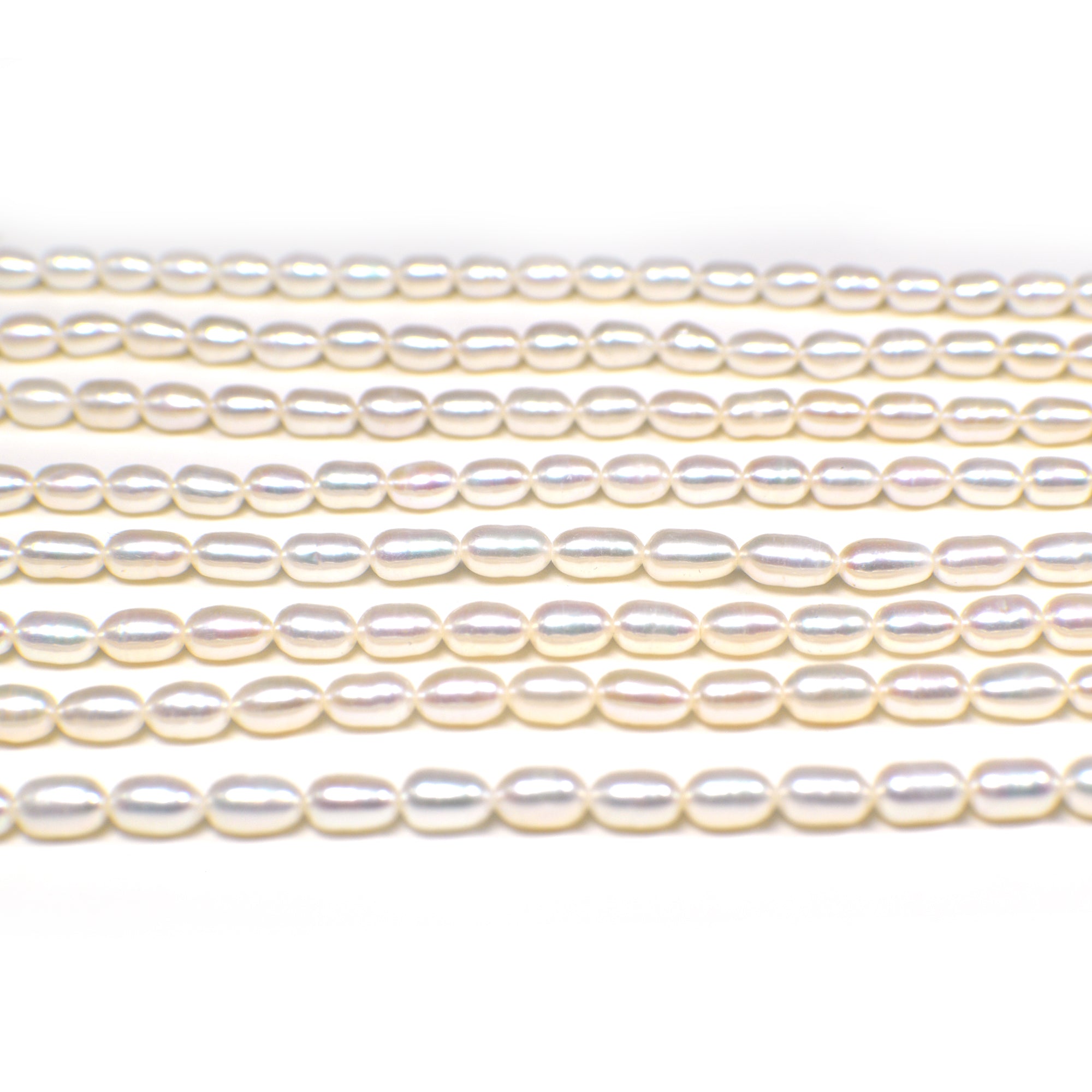 5 x 4 - 6 x 4 MM White Rice Freshwater Pearls Beads