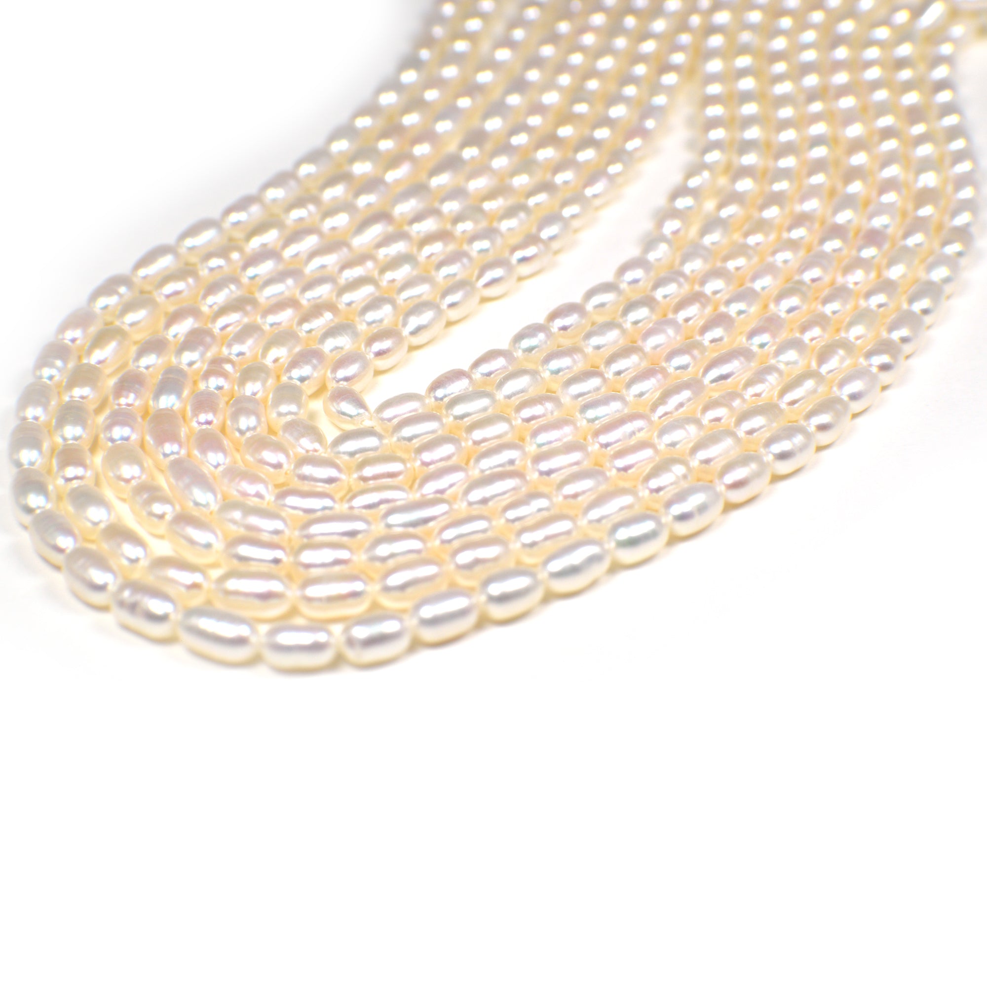 5 x 4 - 6 x 4 MM White Rice Freshwater Pearls Beads