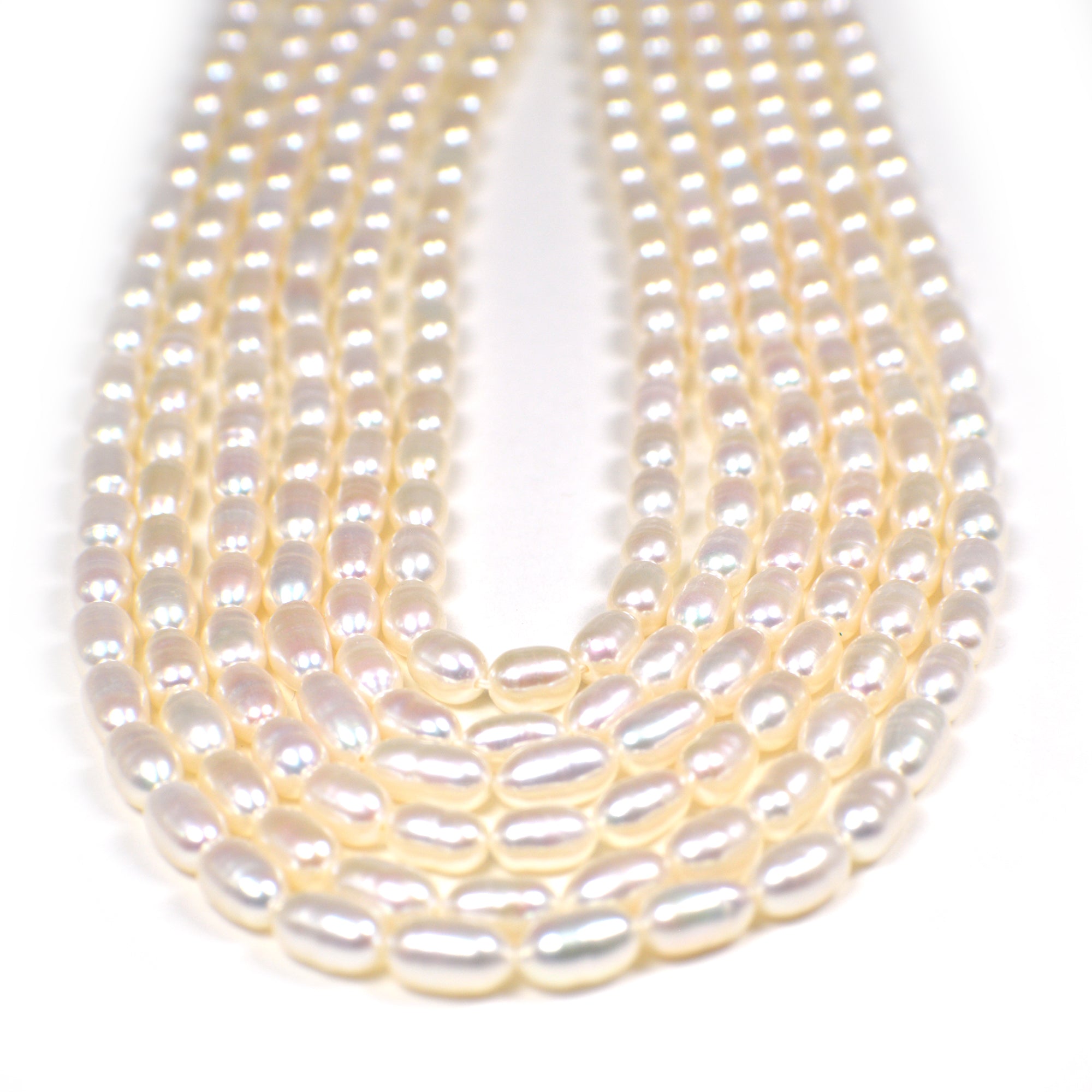 5 x 4 - 6 x 4 MM White Rice Freshwater Pearls Beads