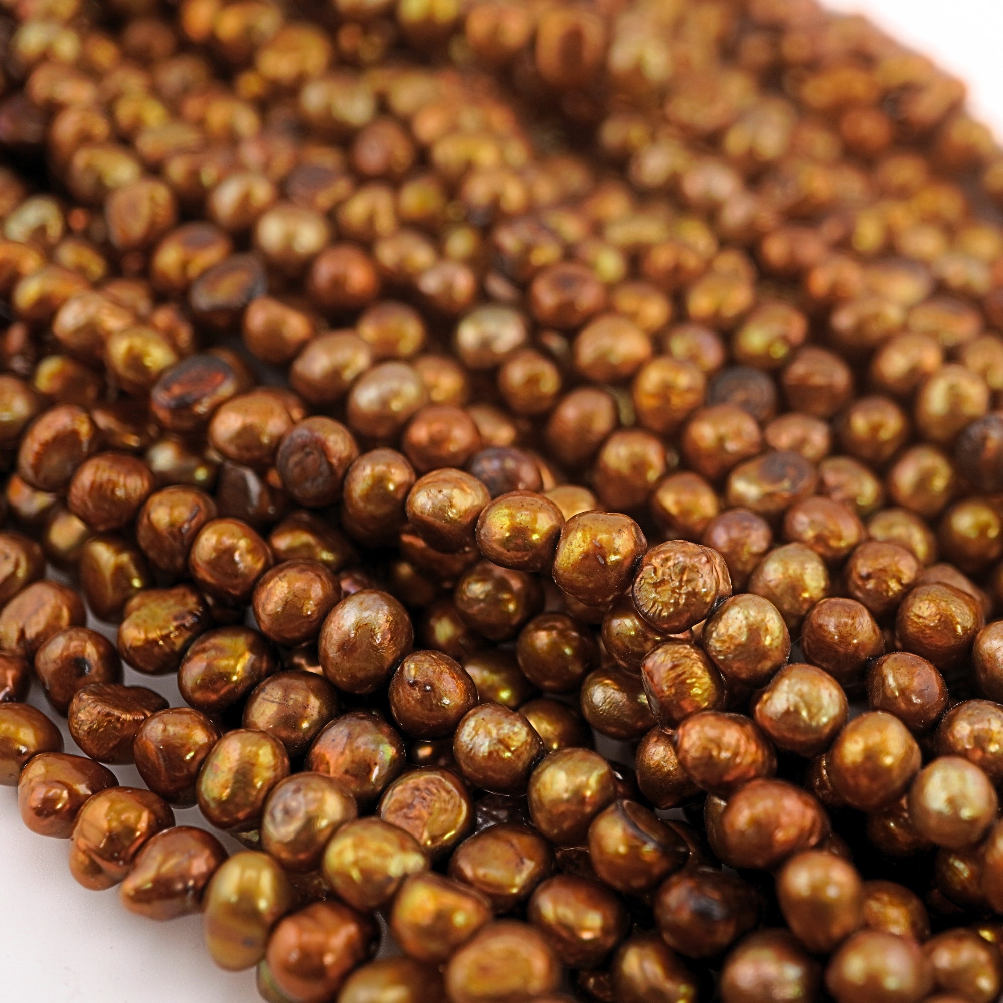 Lustrous golden beads for jewelry