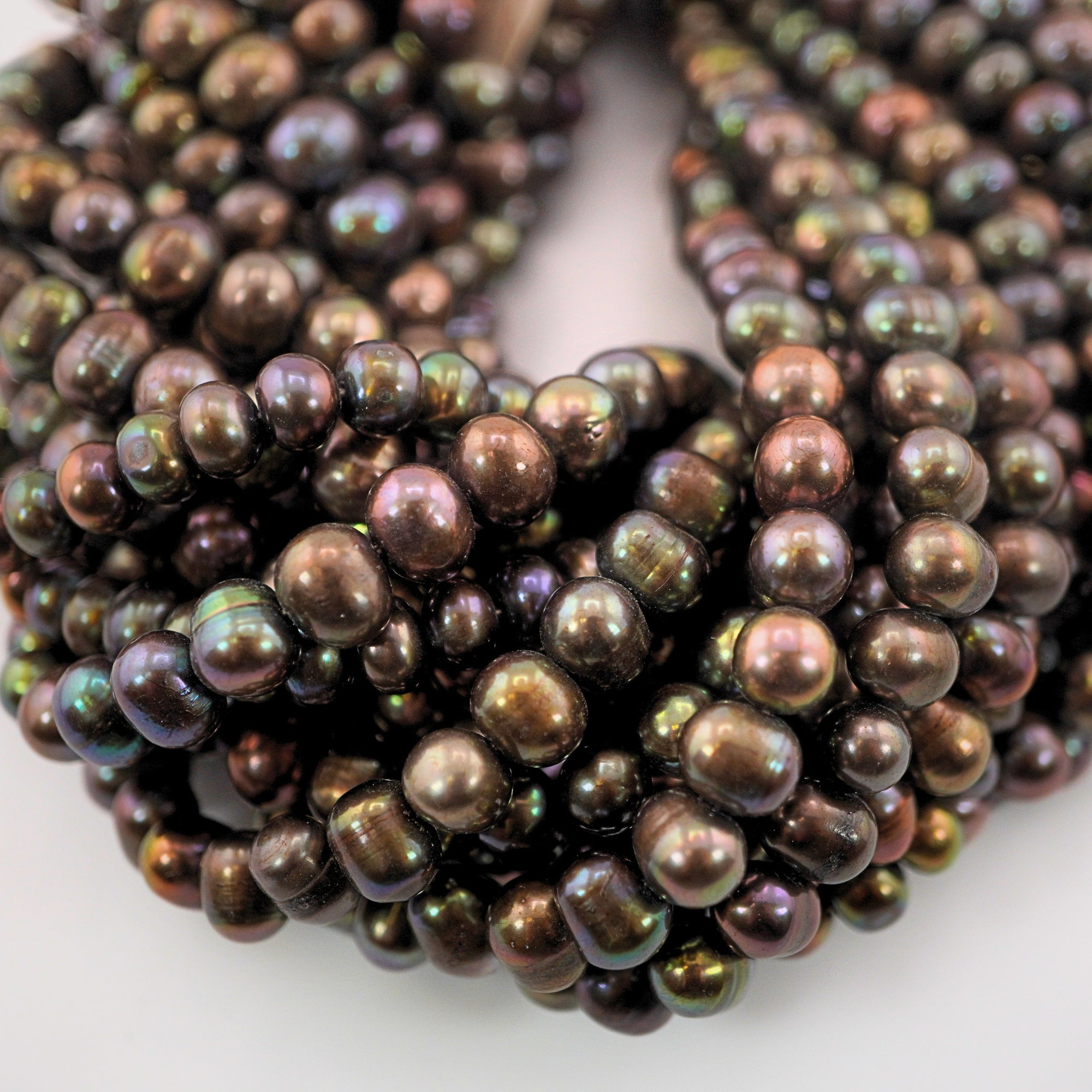 Lustrous peacock freshwater pearls