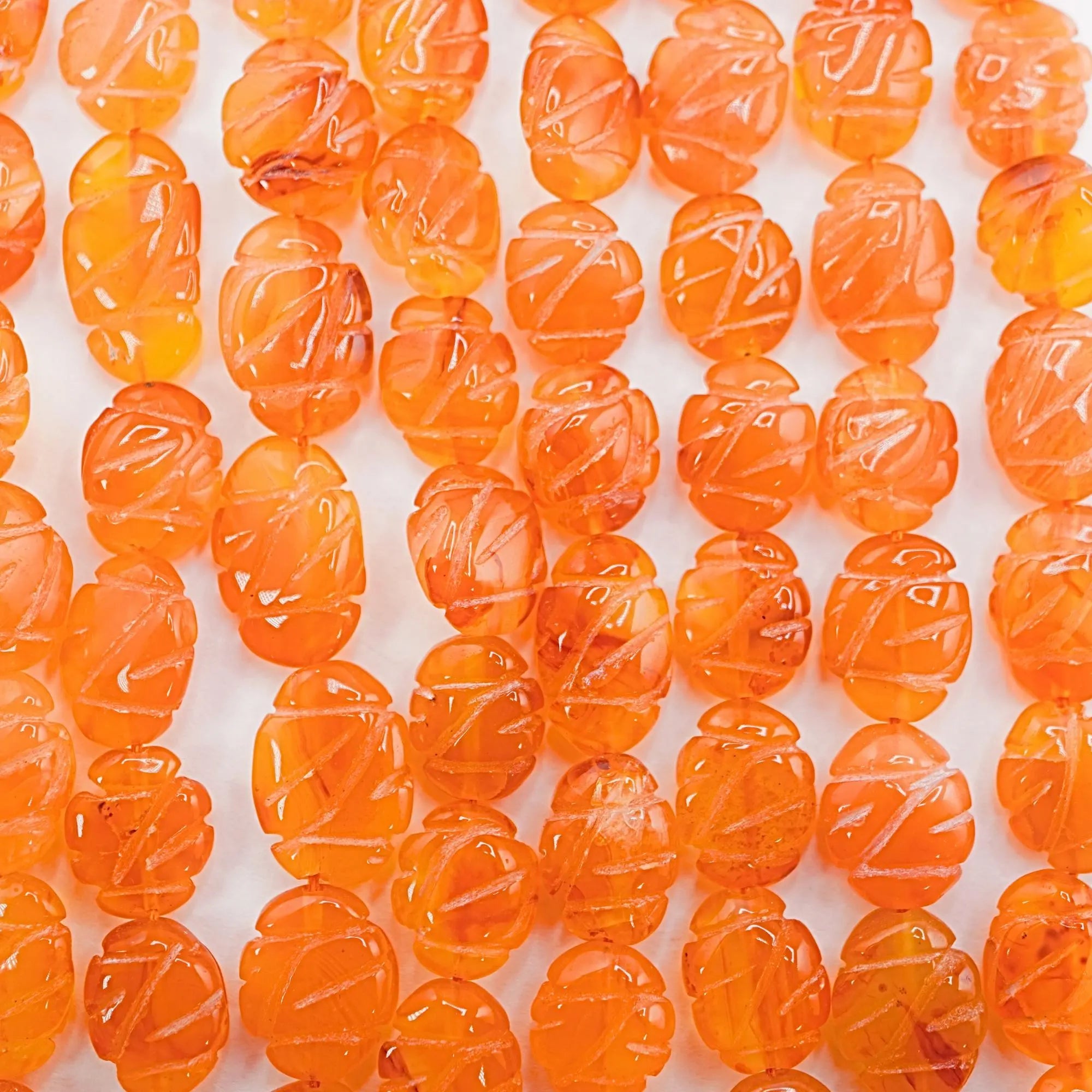 Orange Carnelian Carved Oval Shape Gemstone Strand Beads