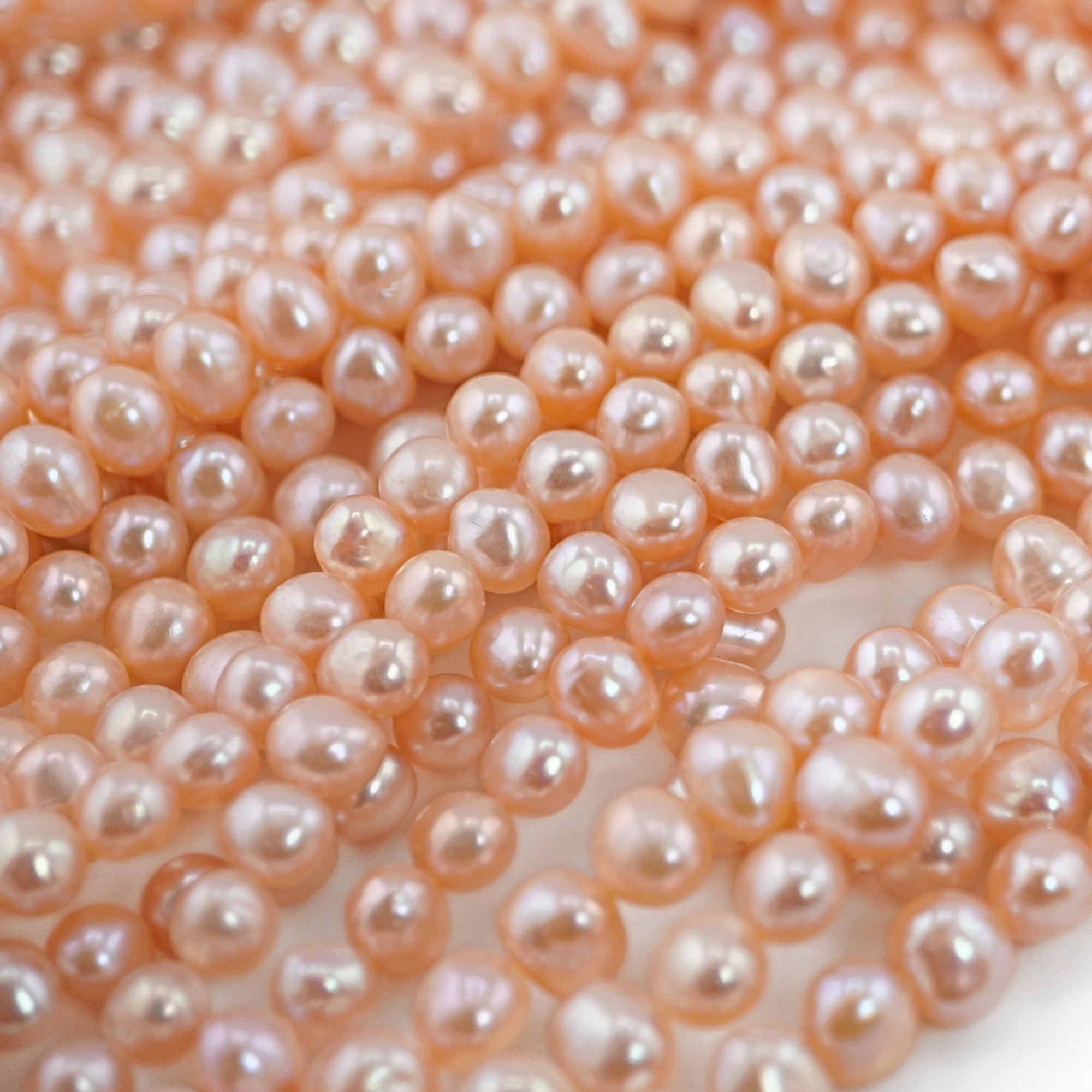Oval Pearl Beads in Peach Tone