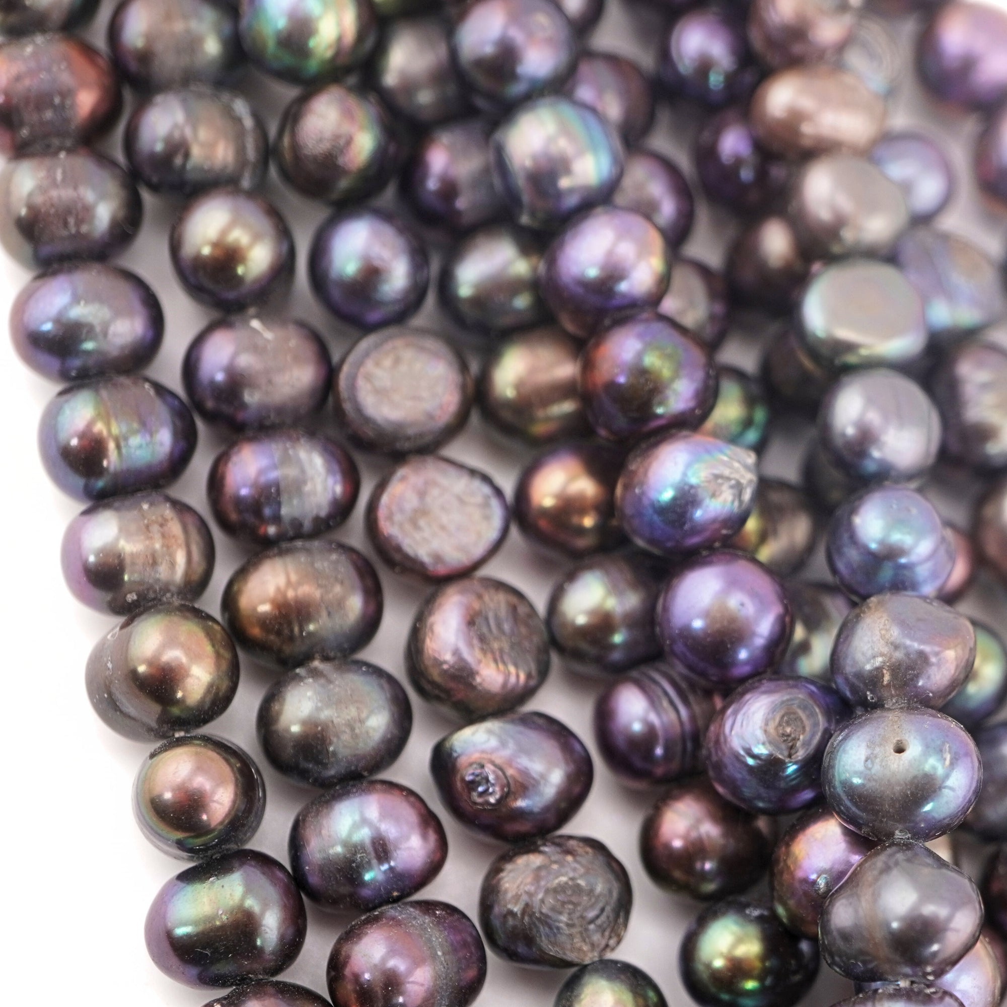 Oval freshwater oval pearls peacock color