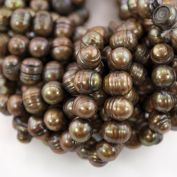 Oval golden beads for DIY jewelry