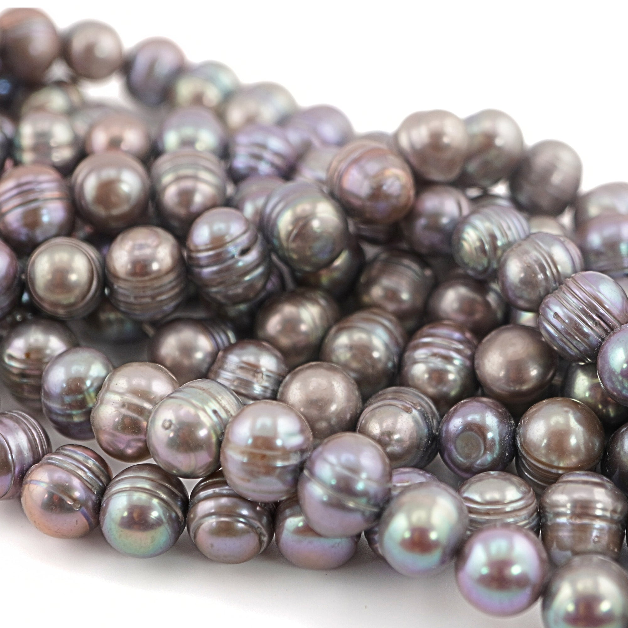 Oval gray freshwater pearl strands
