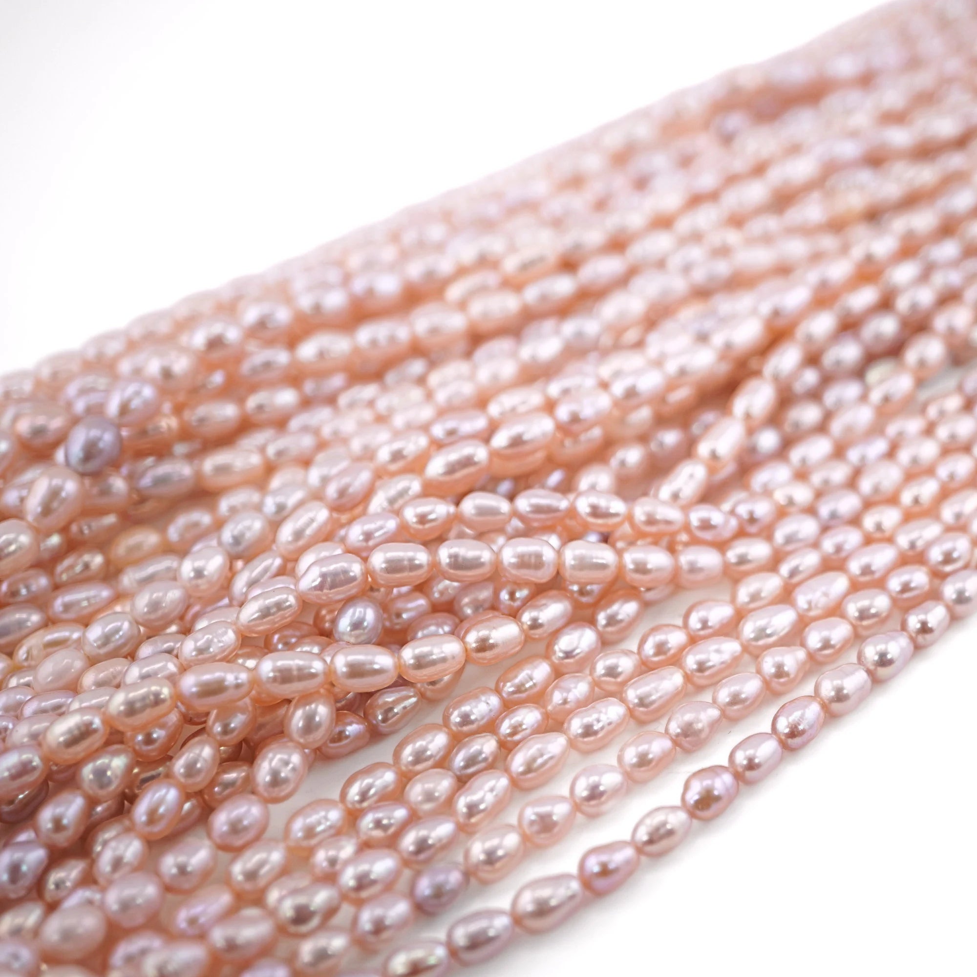 Peach Rice Oval Shape Freshwater Pearls Beads