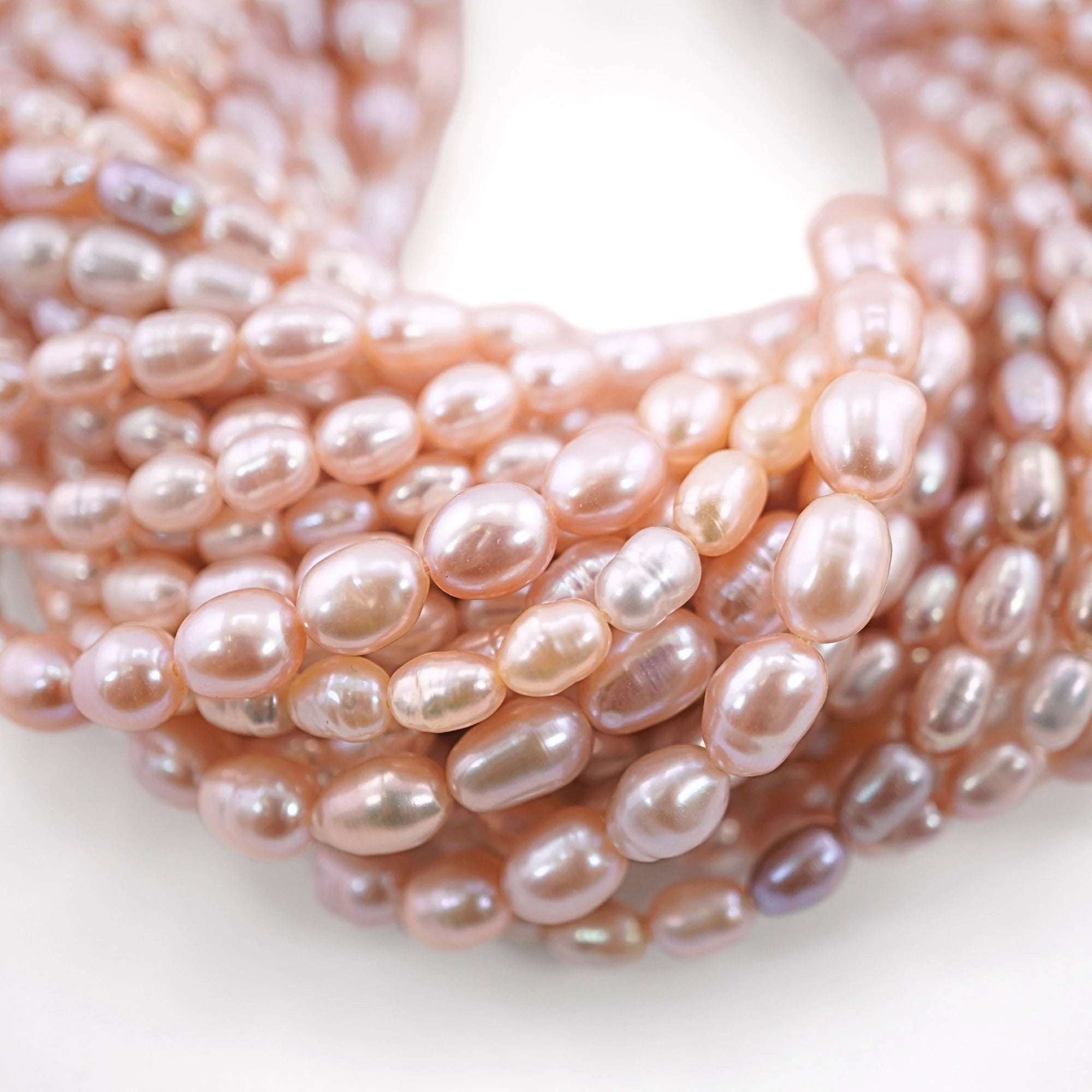 Peach Rice Oval Shape Freshwater Pearls Beads