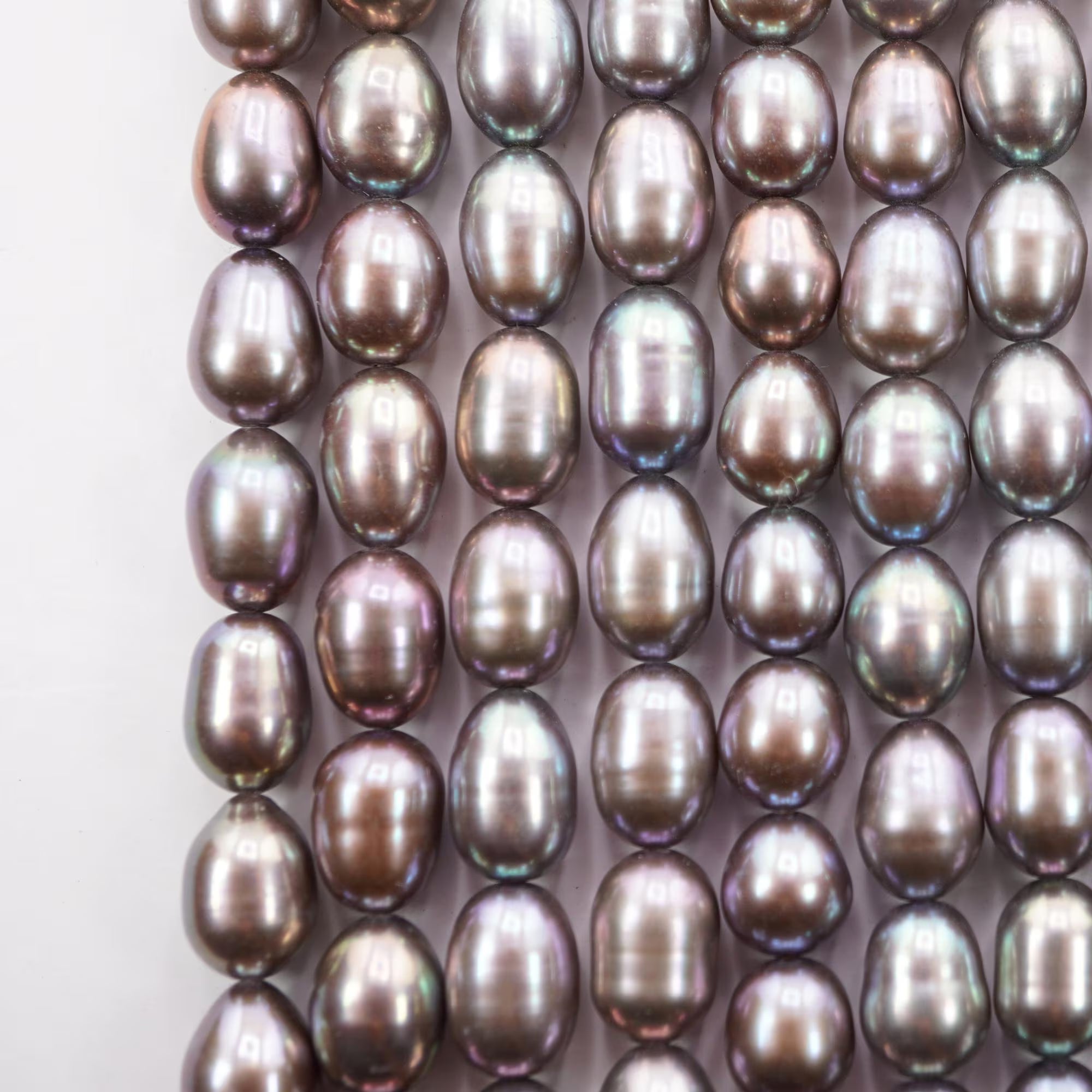 Peacock Freshwater Pearls Oval Shape Smooth Beads