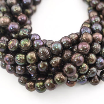 Peacock Near Round Freshwater Pearls Beads close-up