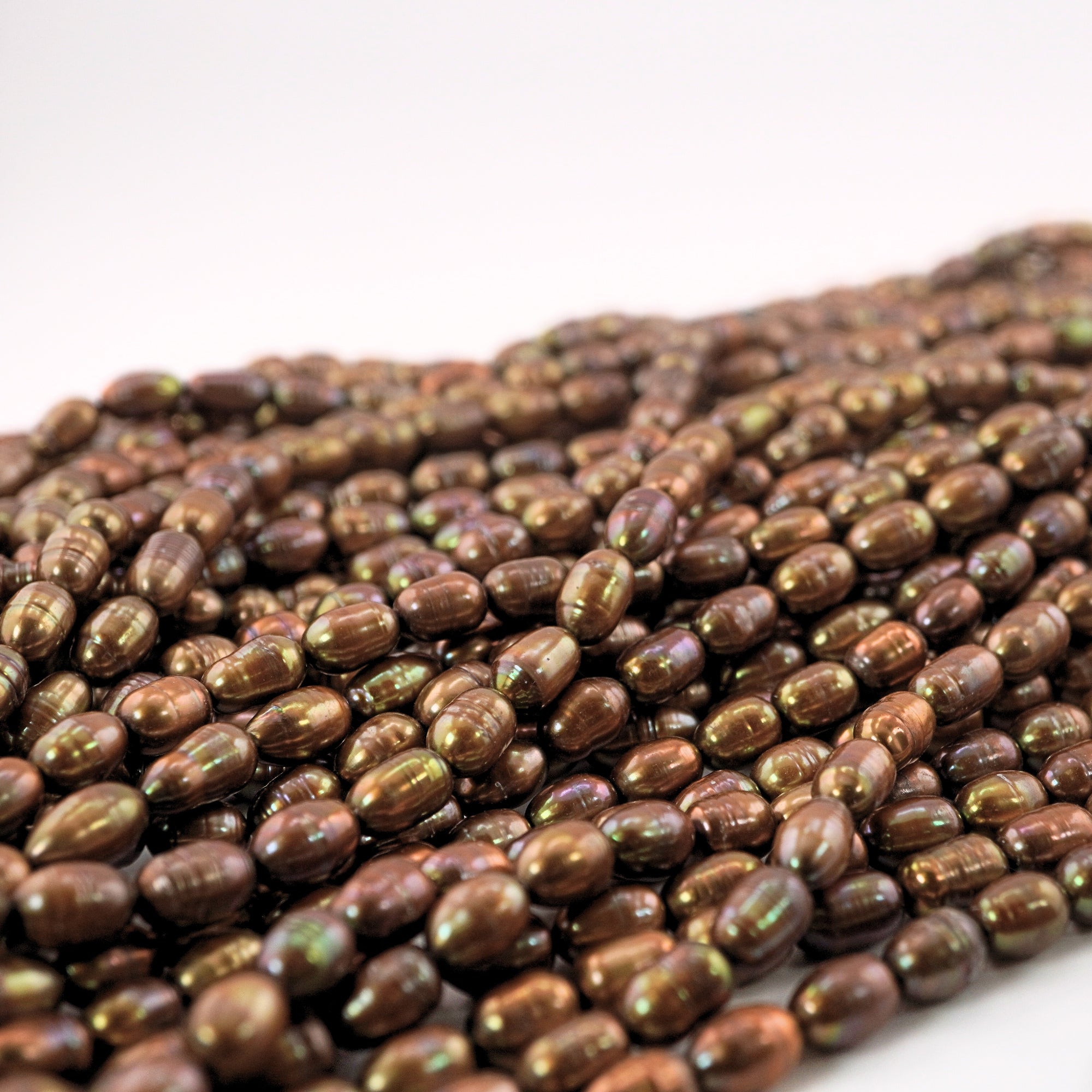 Rice shape gold freshwater pearls