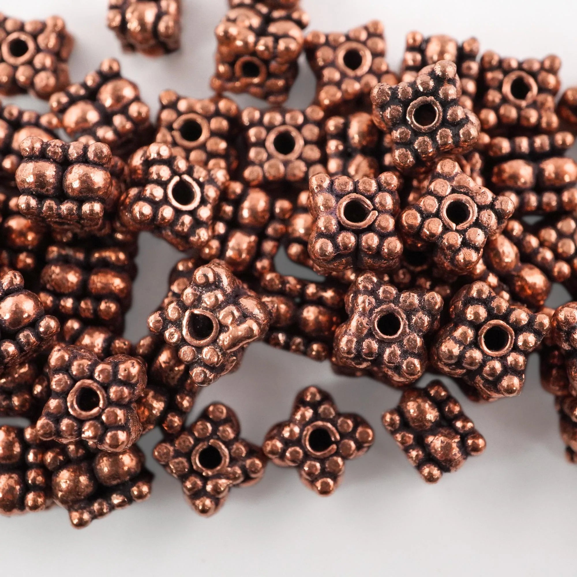 Rustic boho square daisy beads close-up