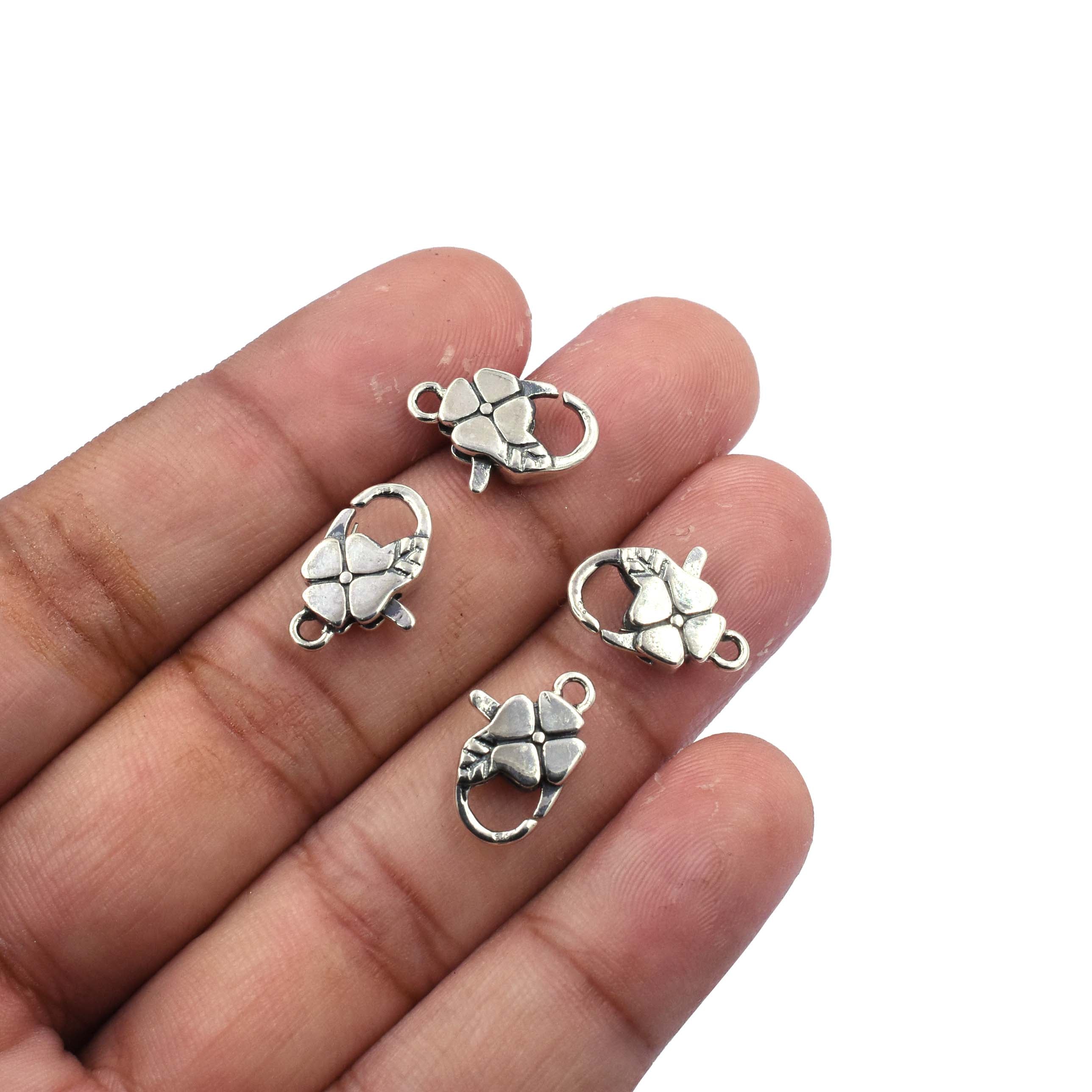 Silver lobster clasp with flower design