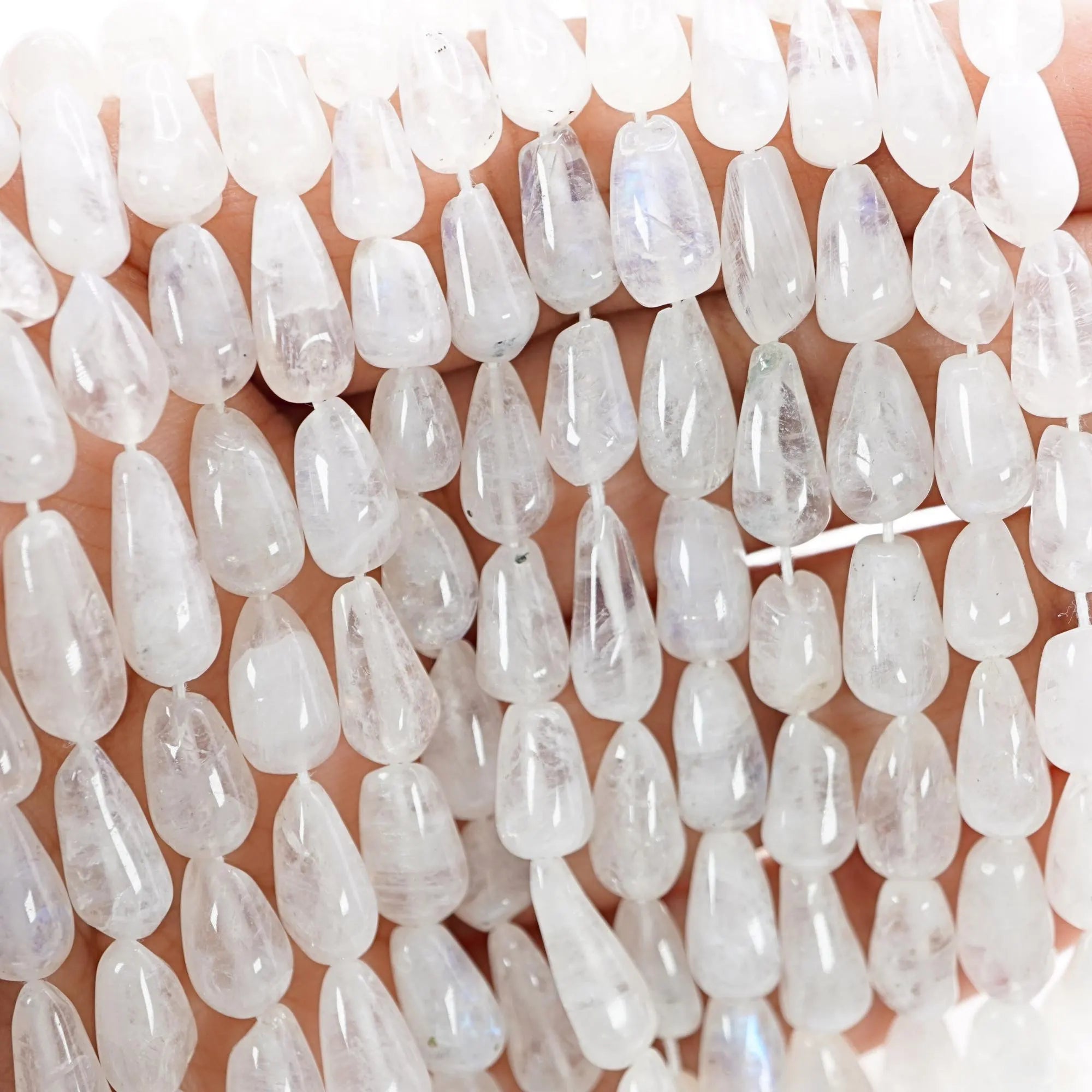 Wholesale rainbow moonstone smooth beads teardrop shape