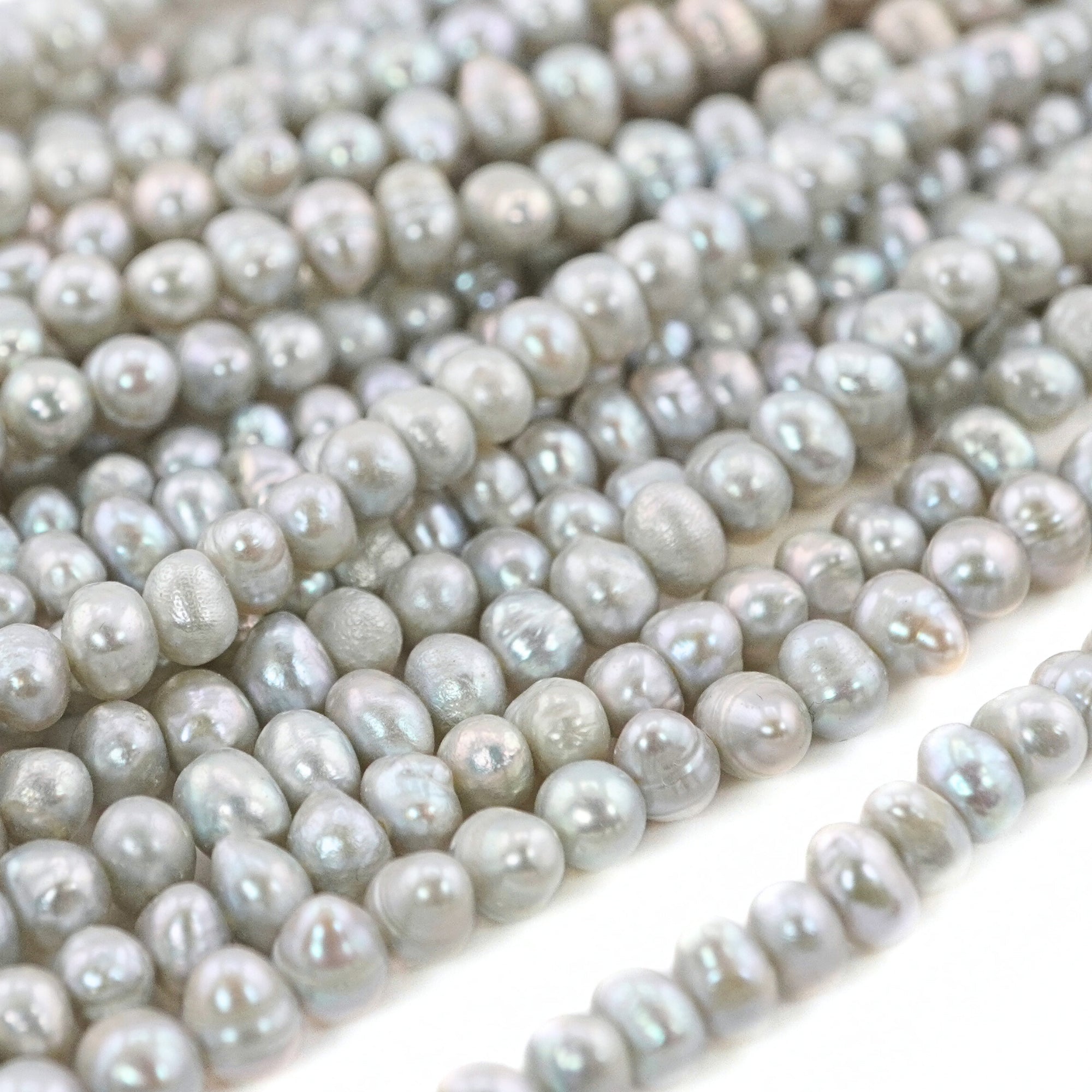close-up of sky blue pearl strand