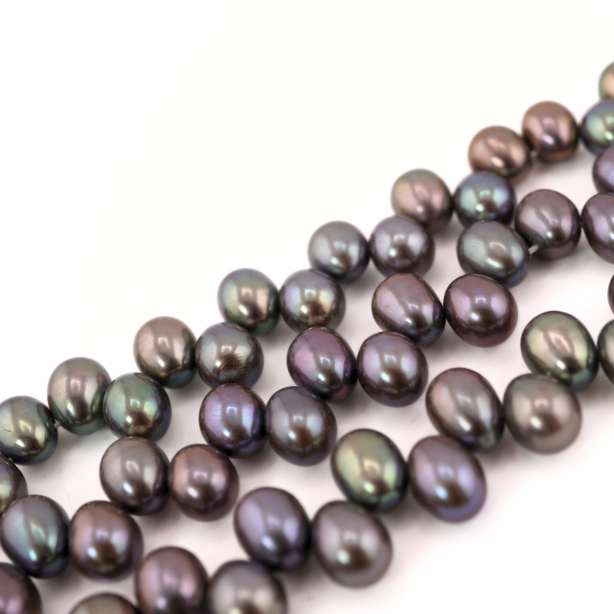 designer oval pearl beads