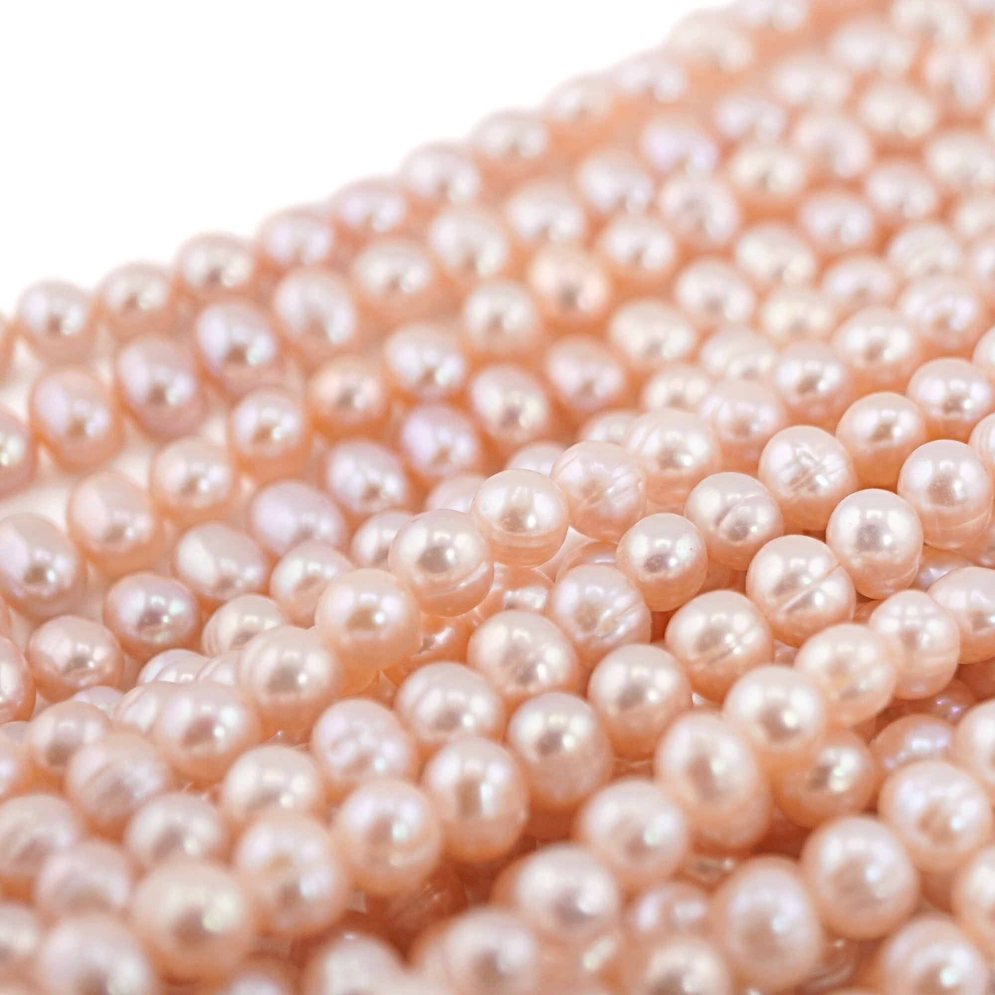 freshwater pearls in peach tone for maker