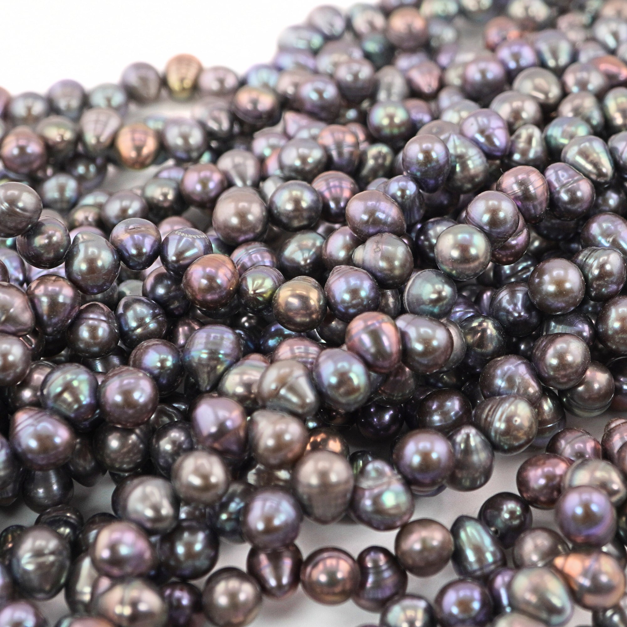 glossy natural peacock pearls