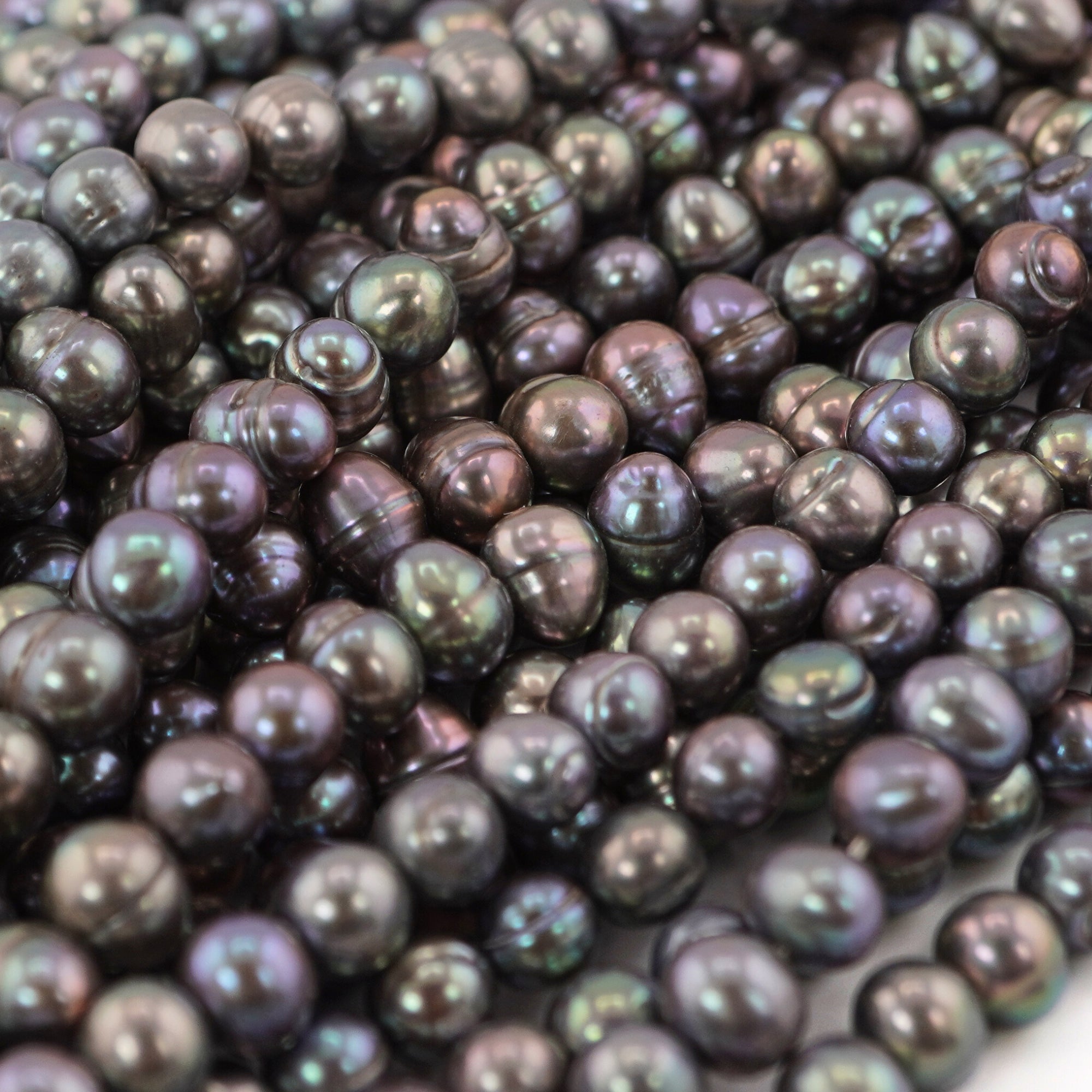 multicolor peacock pearls oval