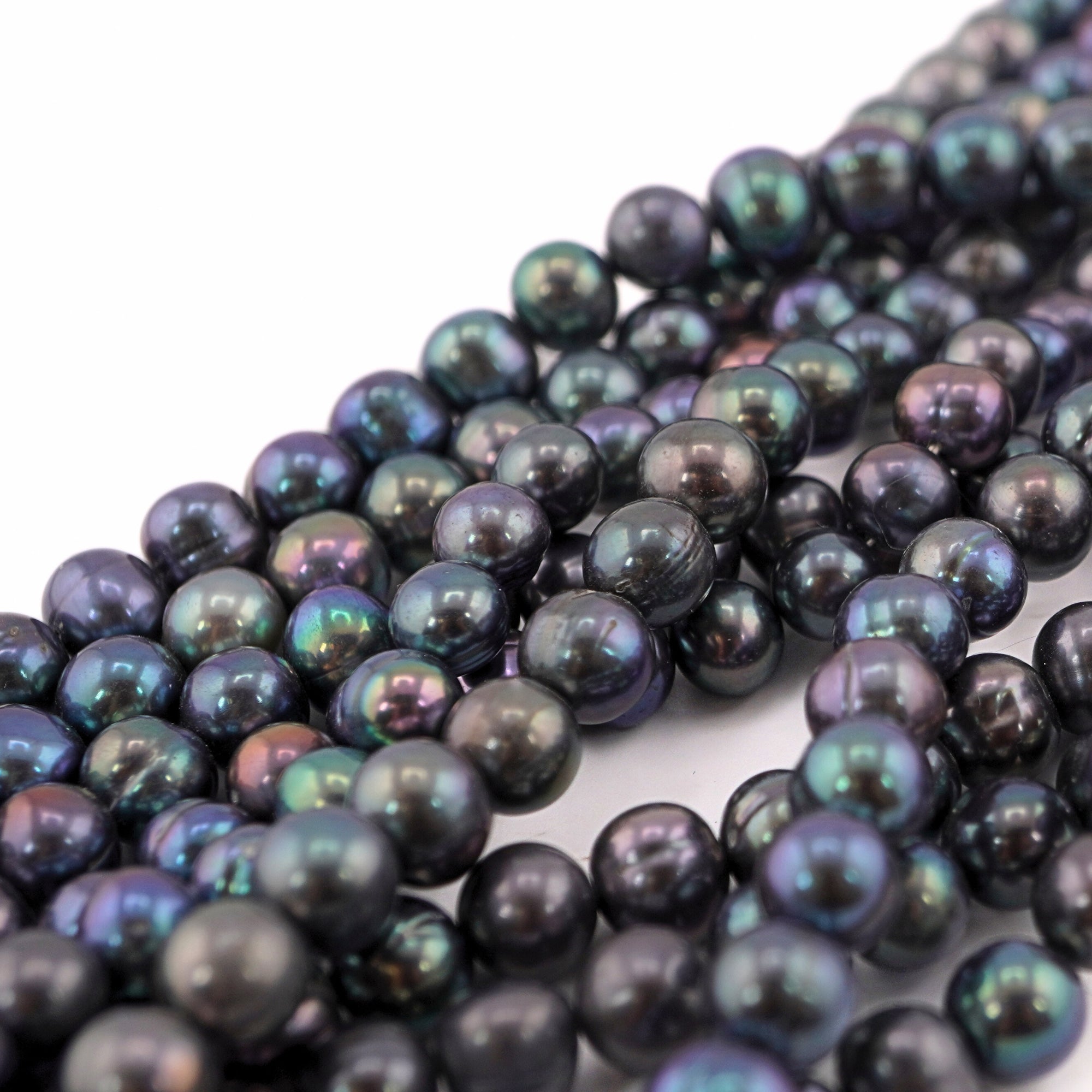 near round peacock pearls