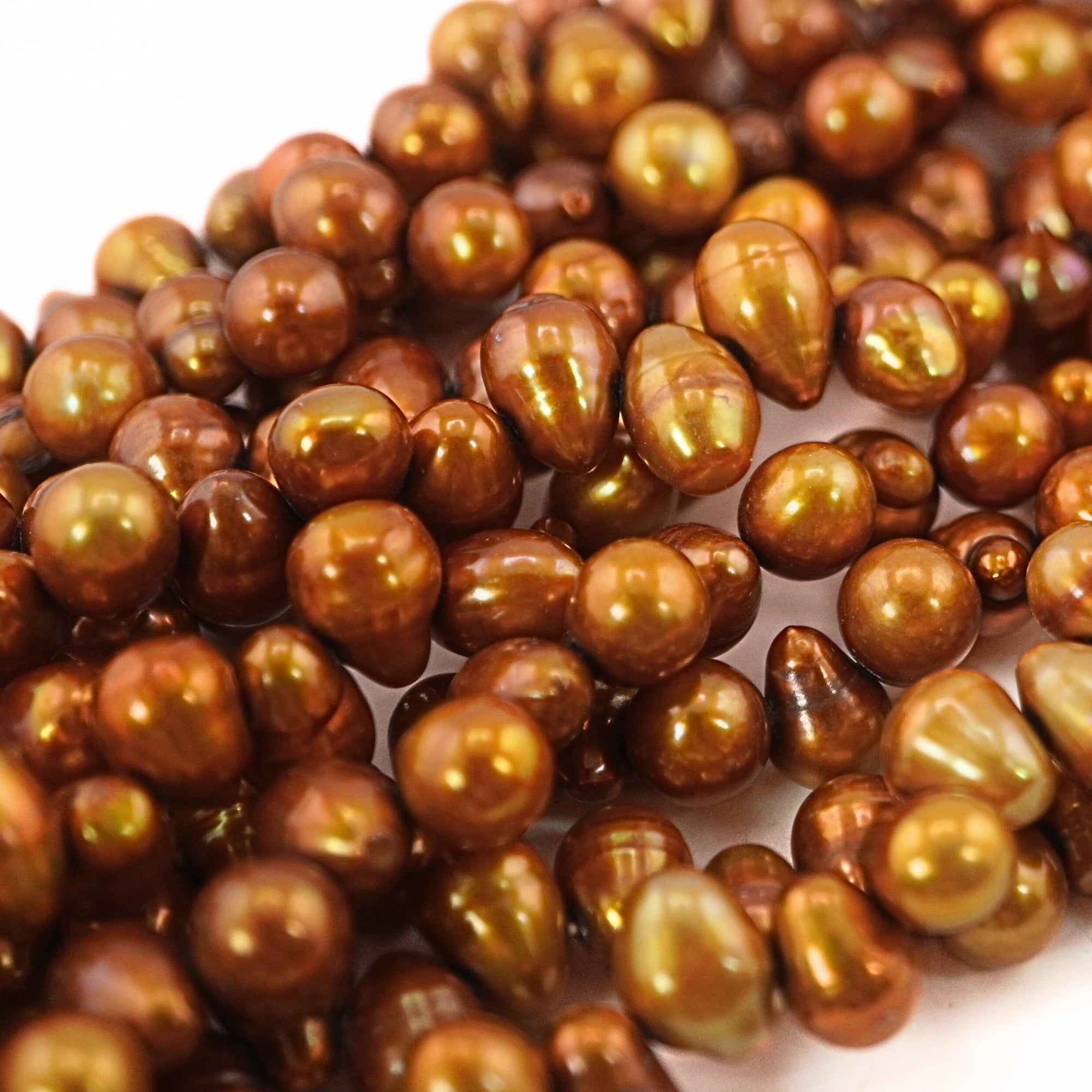 smooth golden oval pearls for necklace making