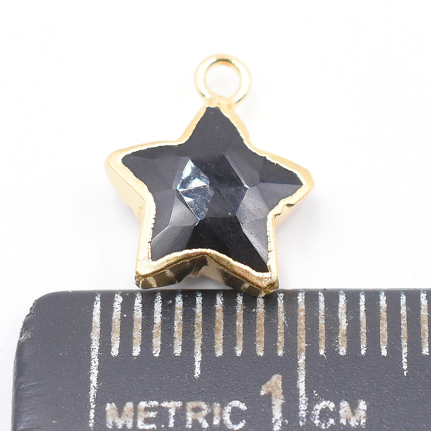 Black Onyx star pendant in a sleek silver electroplated setting