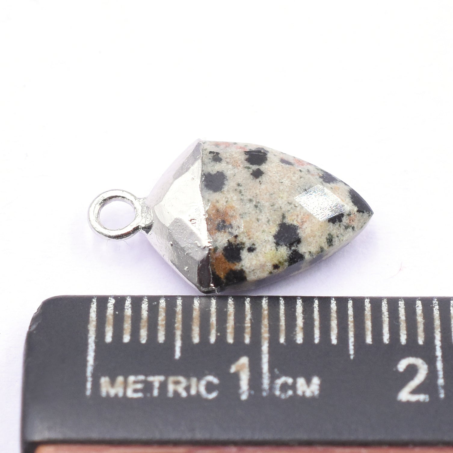 Stylish Shield shaped Dalmatian Jasper pendant with silver detail