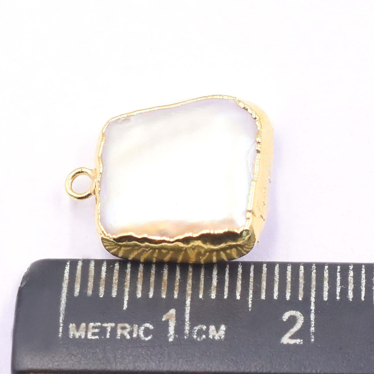 Fresh Water Pearl pendant in square shape with gold trim