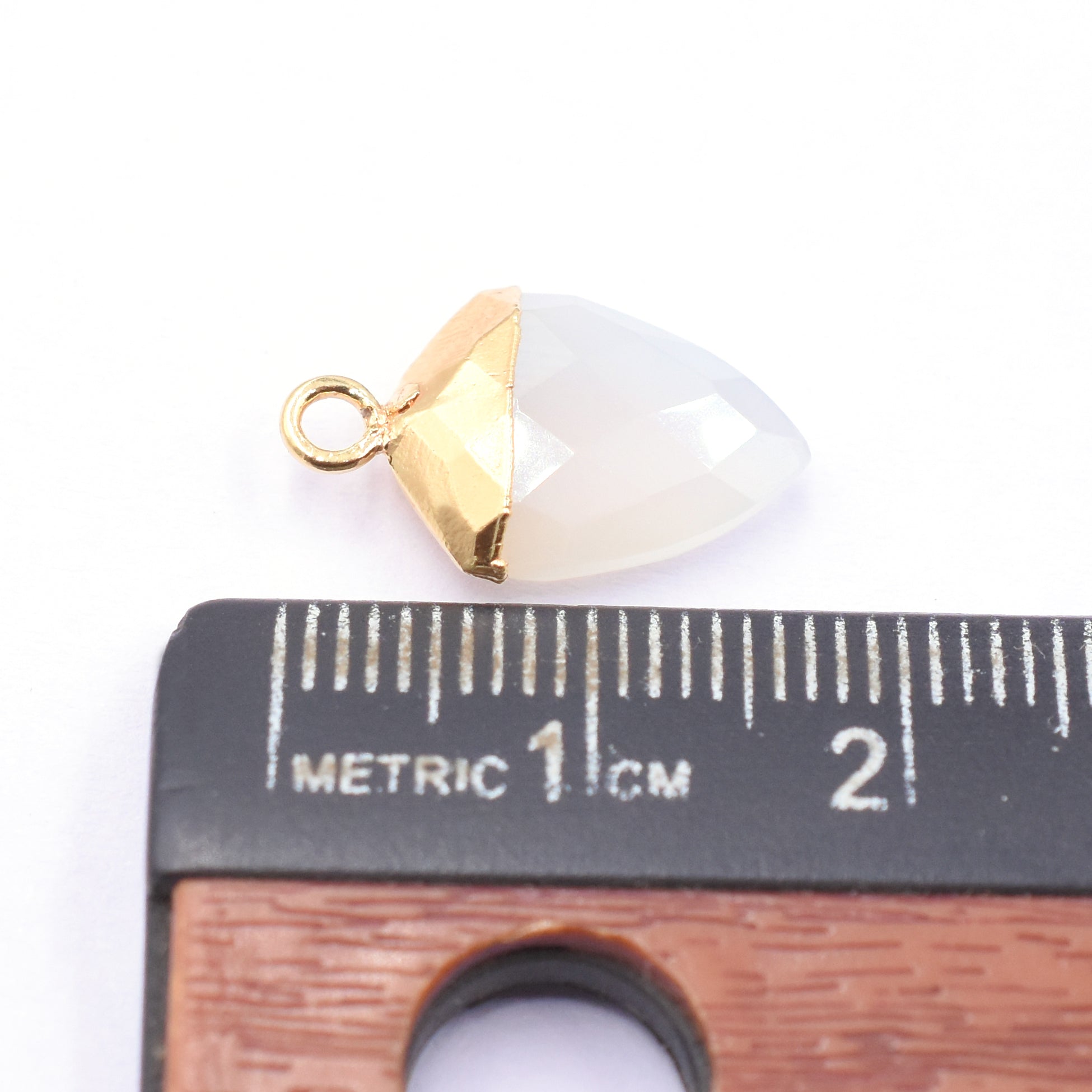 Elegant Shield shaped Chalcedony pendant with gold detailing