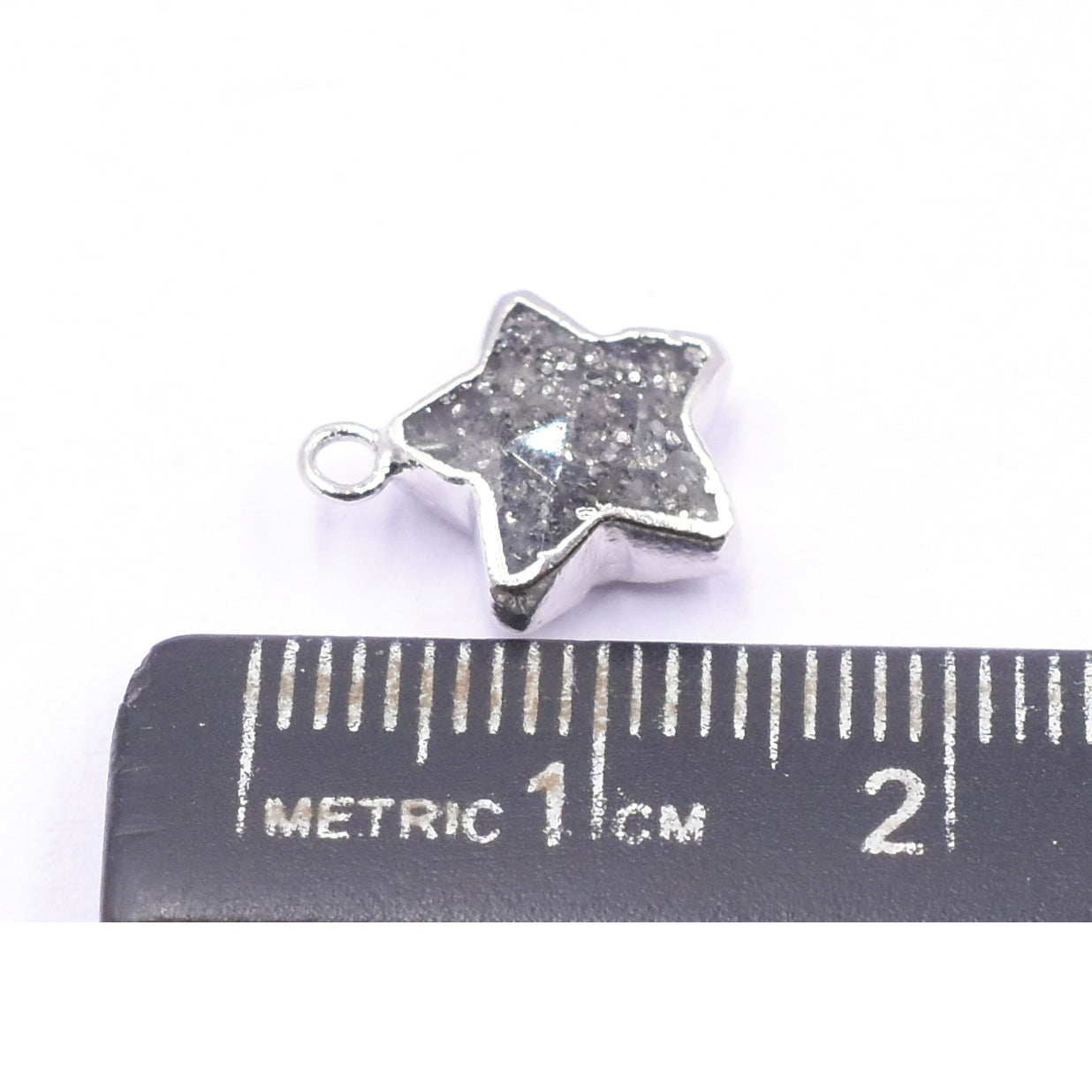 Unique Black Sunstone star-shaped pendant with Silver detailing