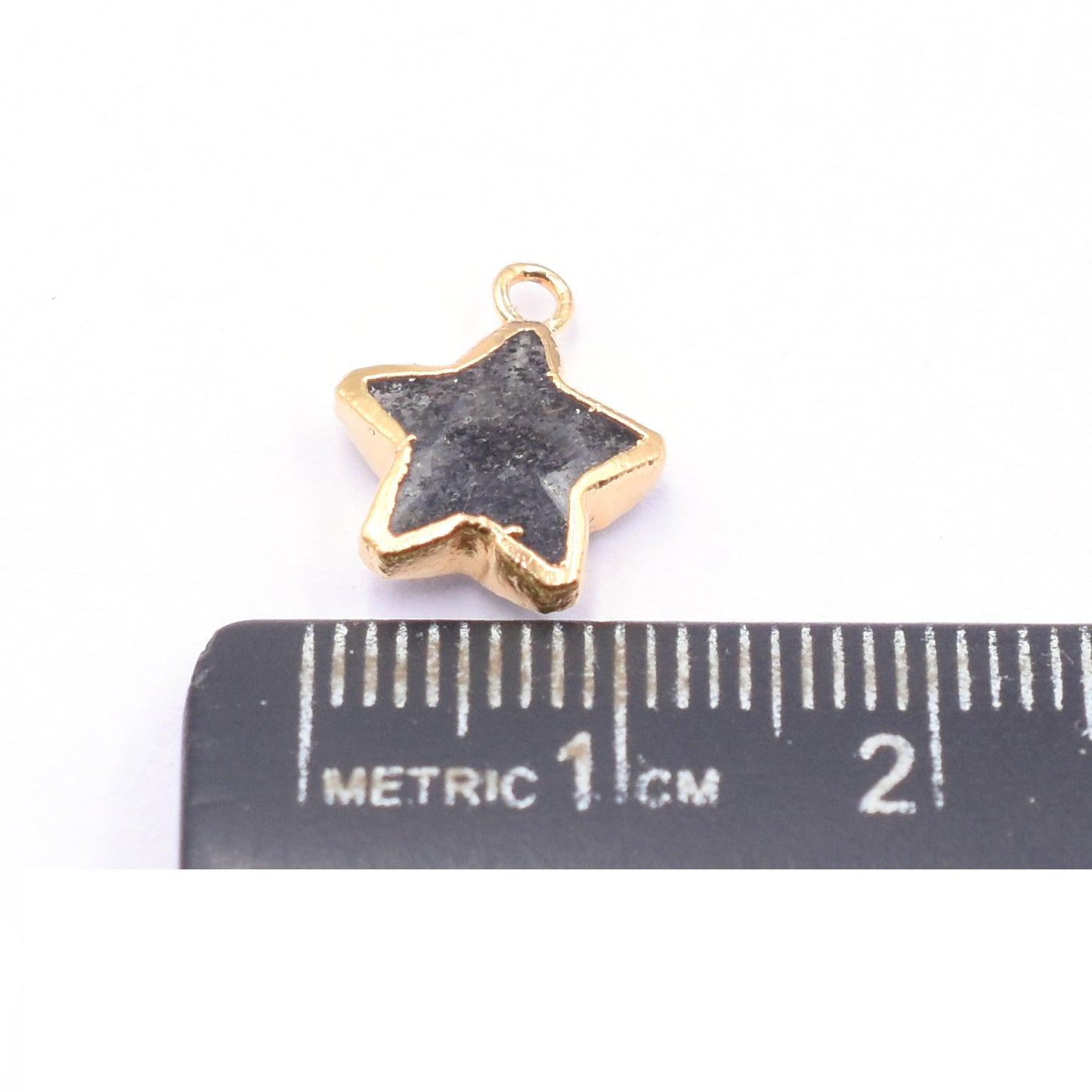 Gold electroplated Black Sunstone pendant in star shape