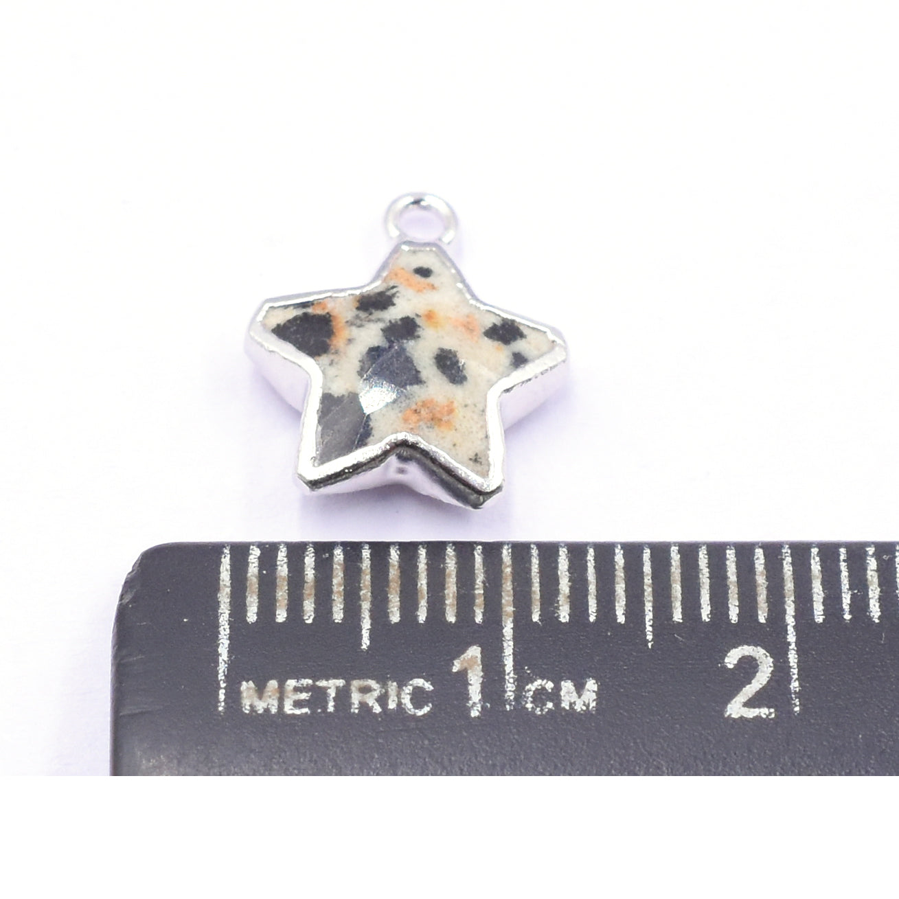 Dalmatian Jasper star pendant in silver frame