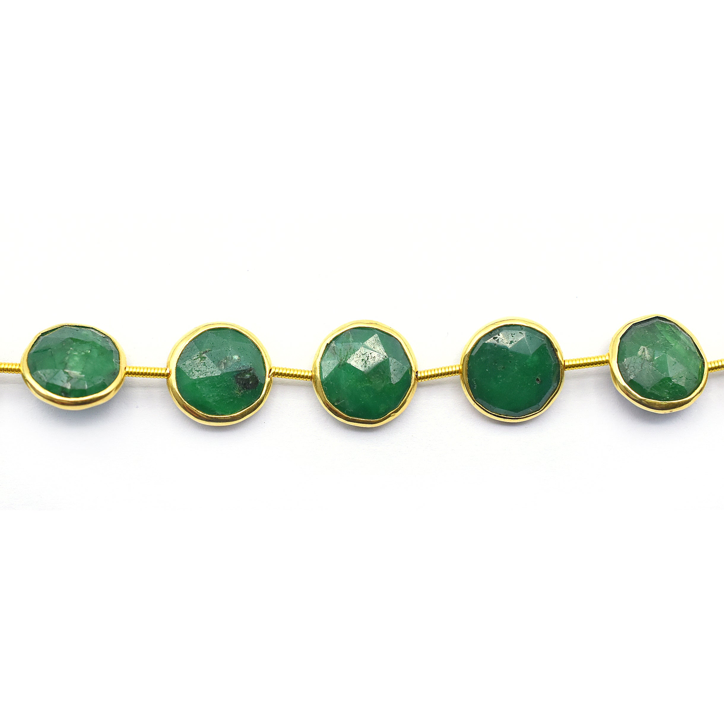 Round green corundum gemstone strand